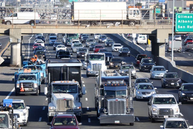 <p>Traffic moves along Interstate 80 in Berkeley, California, in February 2022. Emissions from vehicles help contribute to climate change and come with health risks for millions of Americans. An environmental group says regulation rollbacks under the incoming Trump administration could lead to swift legal action </p>