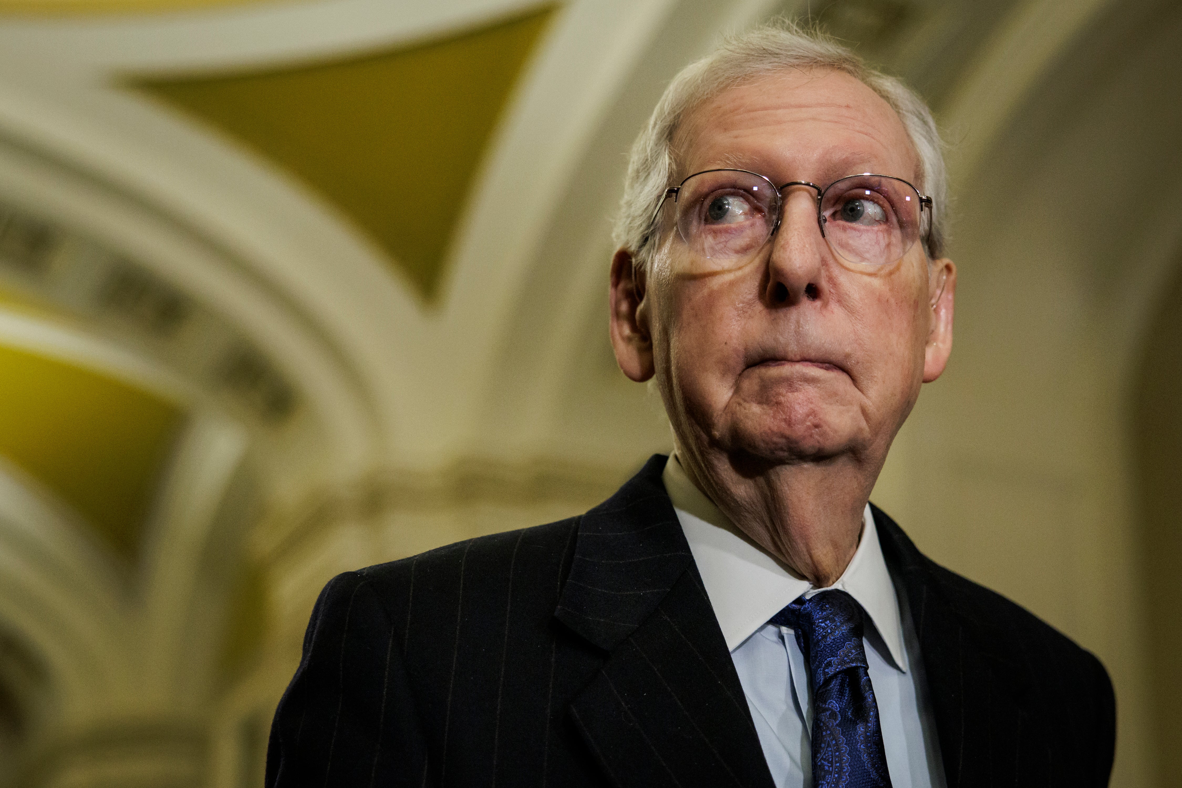 Kentucky Republican Senate Minority Leader Mitch McConnell Ispeaks during a press conference following last January in Washington, D.C. McConnell said he urged the Supreme Court to allow the ban-or-divest law to take effect