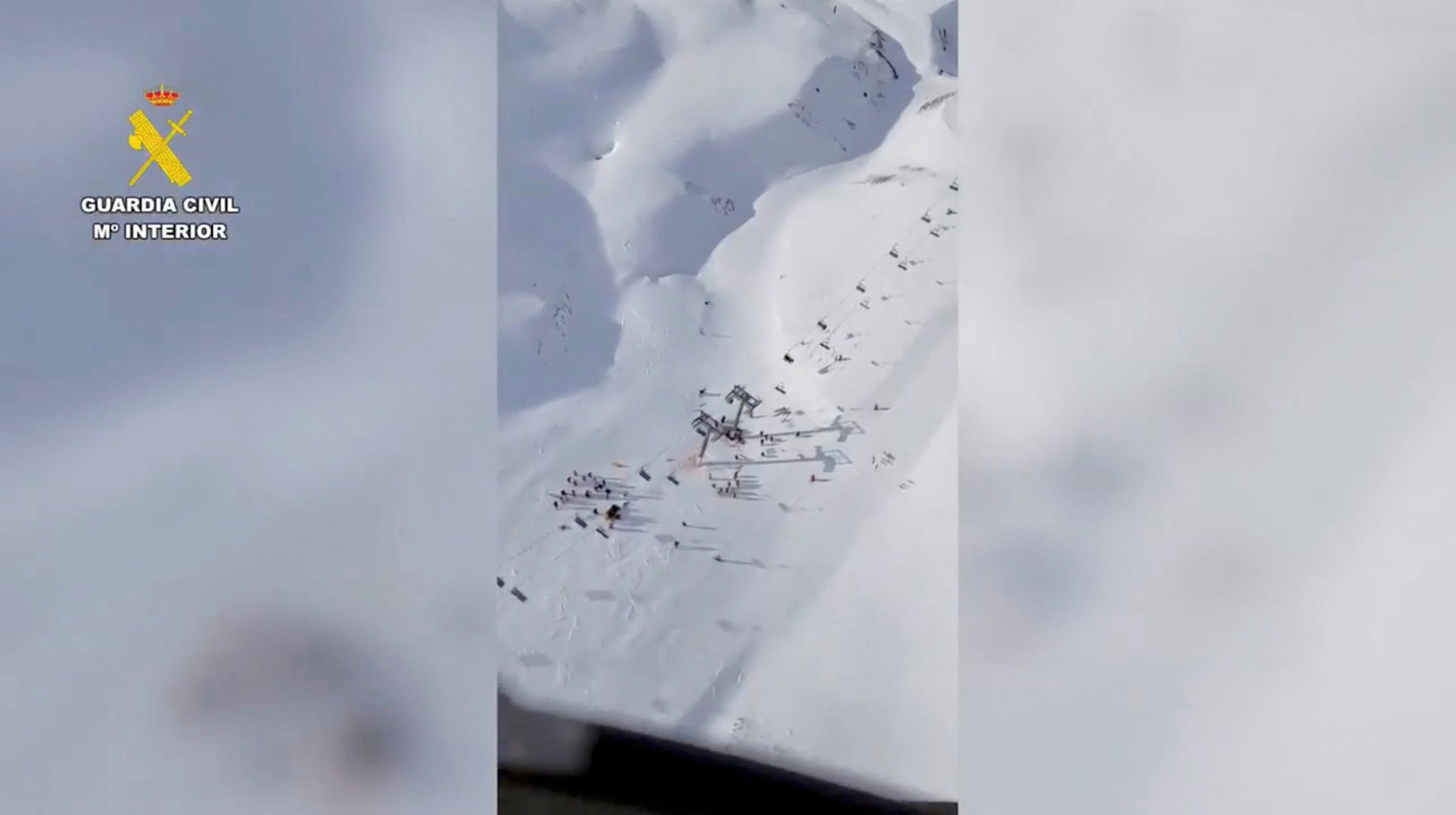 <p>An aerial view shows people gathered around chairlifts following an accident in which a ski lift collapsed</p>