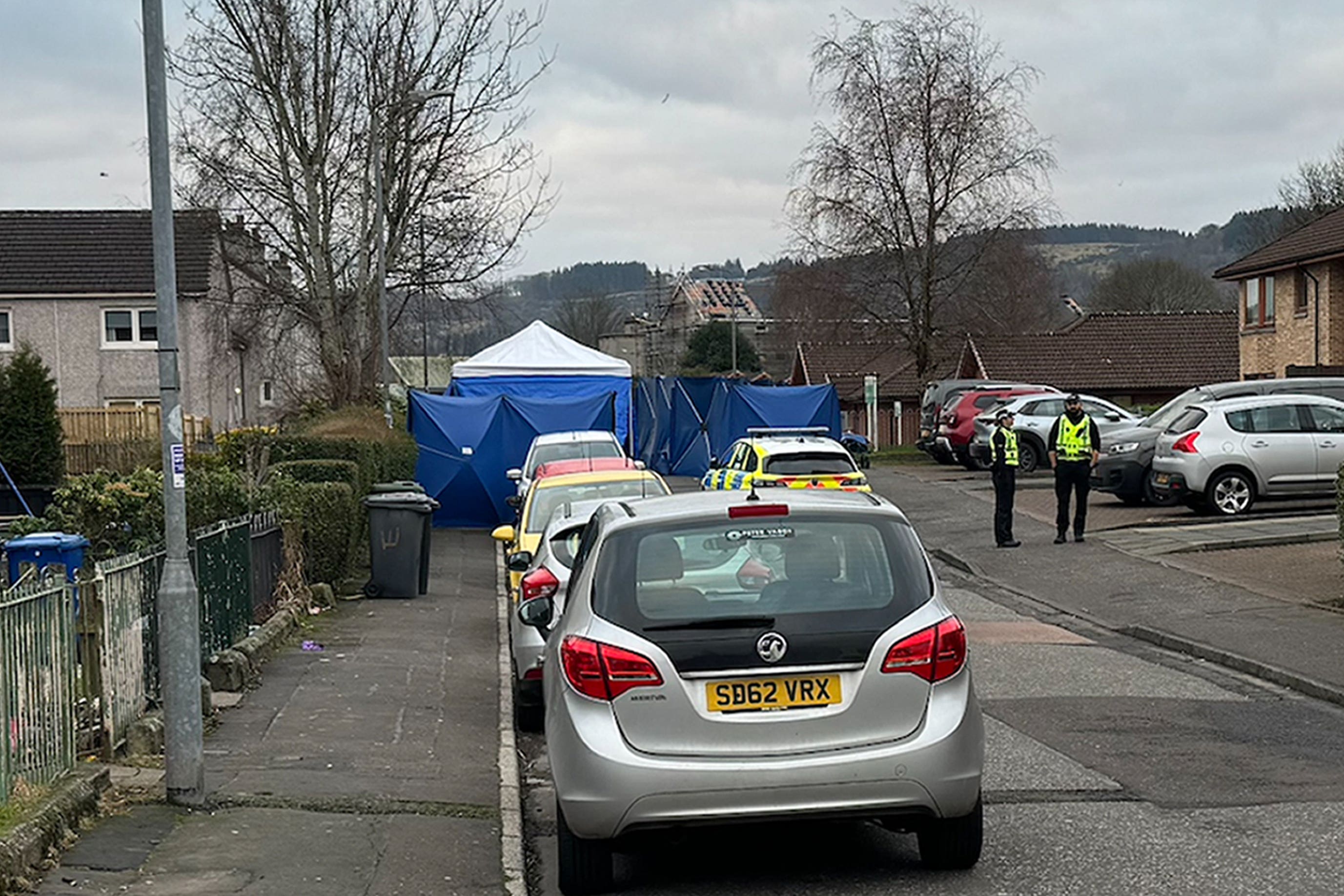 The police cordon and forensic tent on Maree Road, Paisley following an incident in the area on Saturday