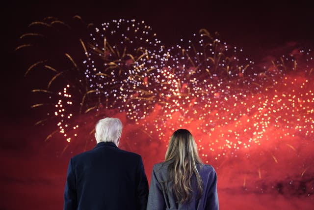 <p>President-elect Donald Trump, Melania Trump and family watch fireworks at Trump National Golf Club early this year</p>