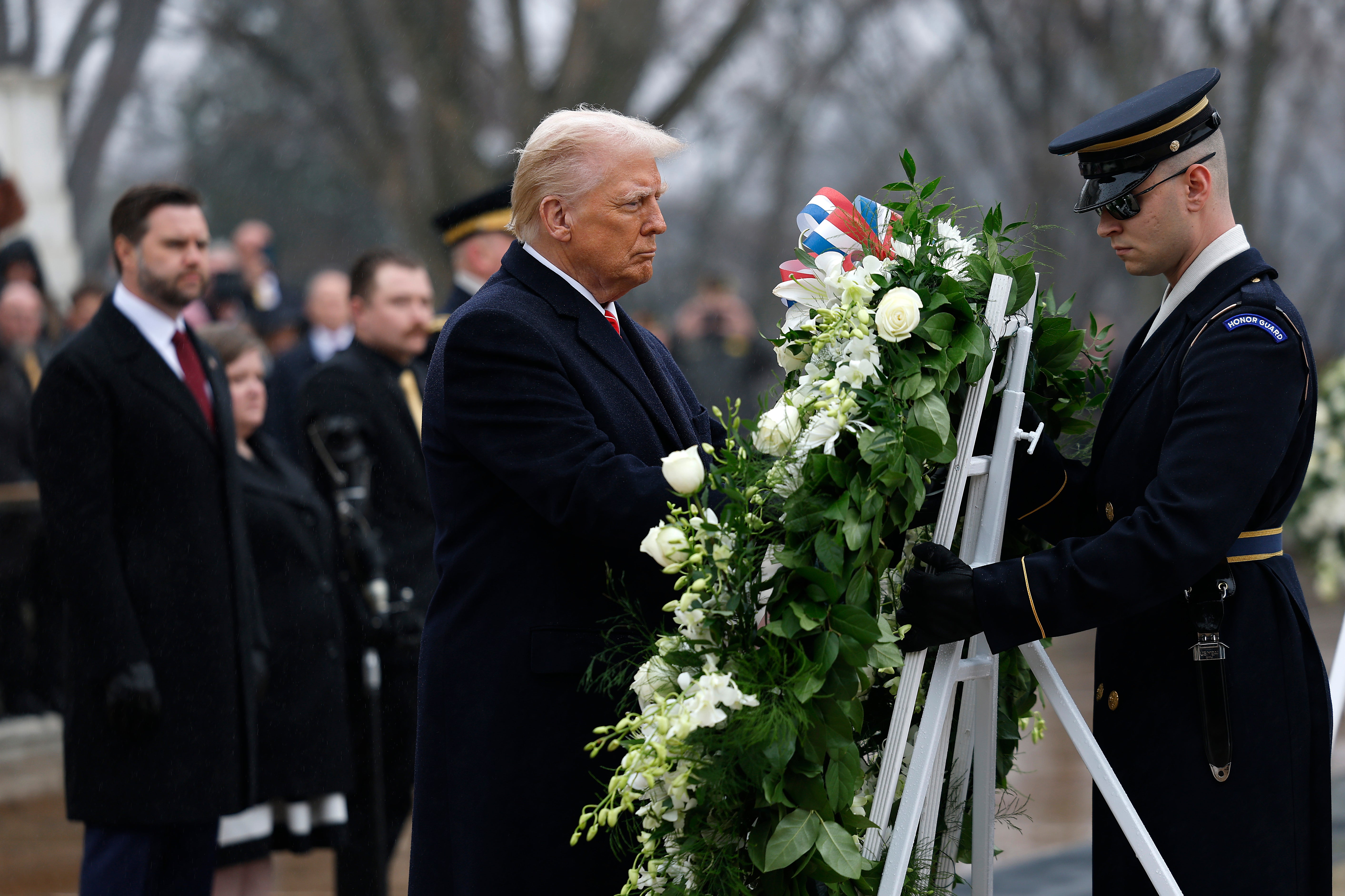 President-elect Donald Trump places a wreath at the Tomb of the Unknown Soldier on Sunday morning