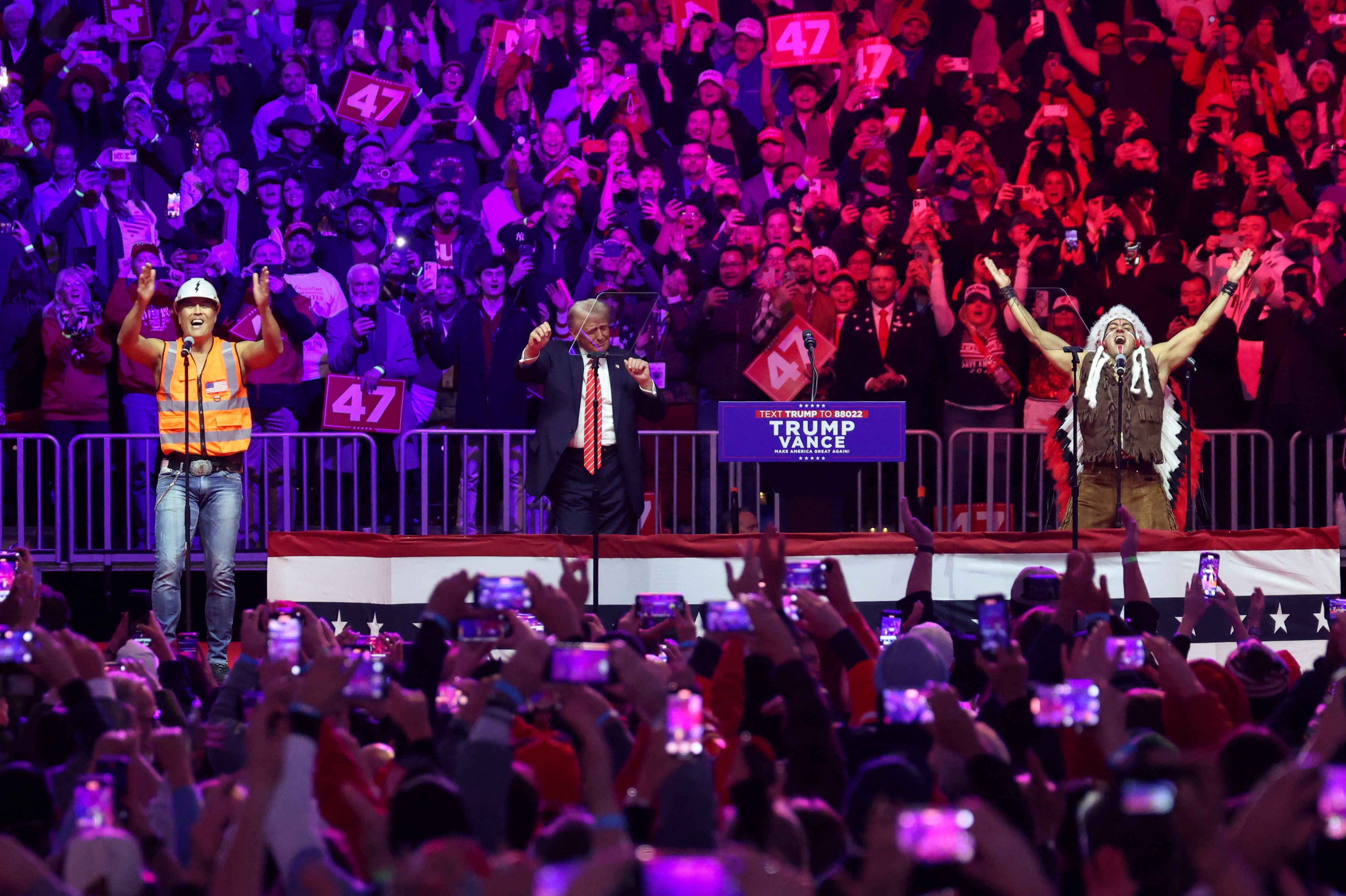 Donald Trump dances with Village People as they perform ‘Y.M.C.A’ at his Washington, D.C. victory rally on Sunday