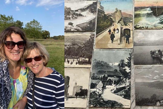 Laura and Liz Parham next to postcards written by their late family member, Frank Hills (family handout/PA)