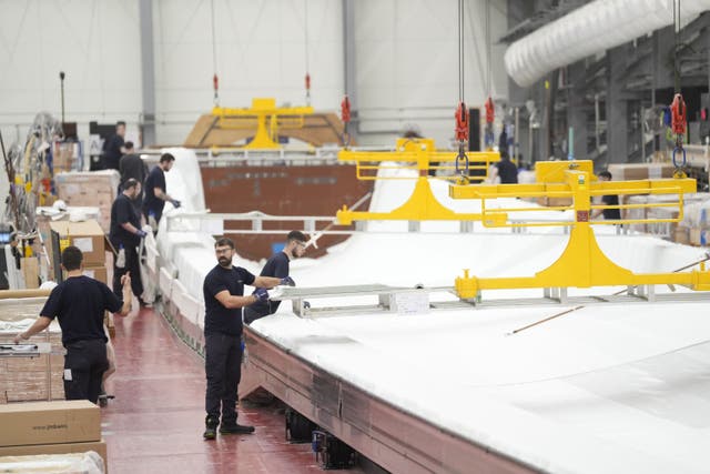 Worker in the Siemens Energy turbine factory in Hull (Danny Lawson/PA)