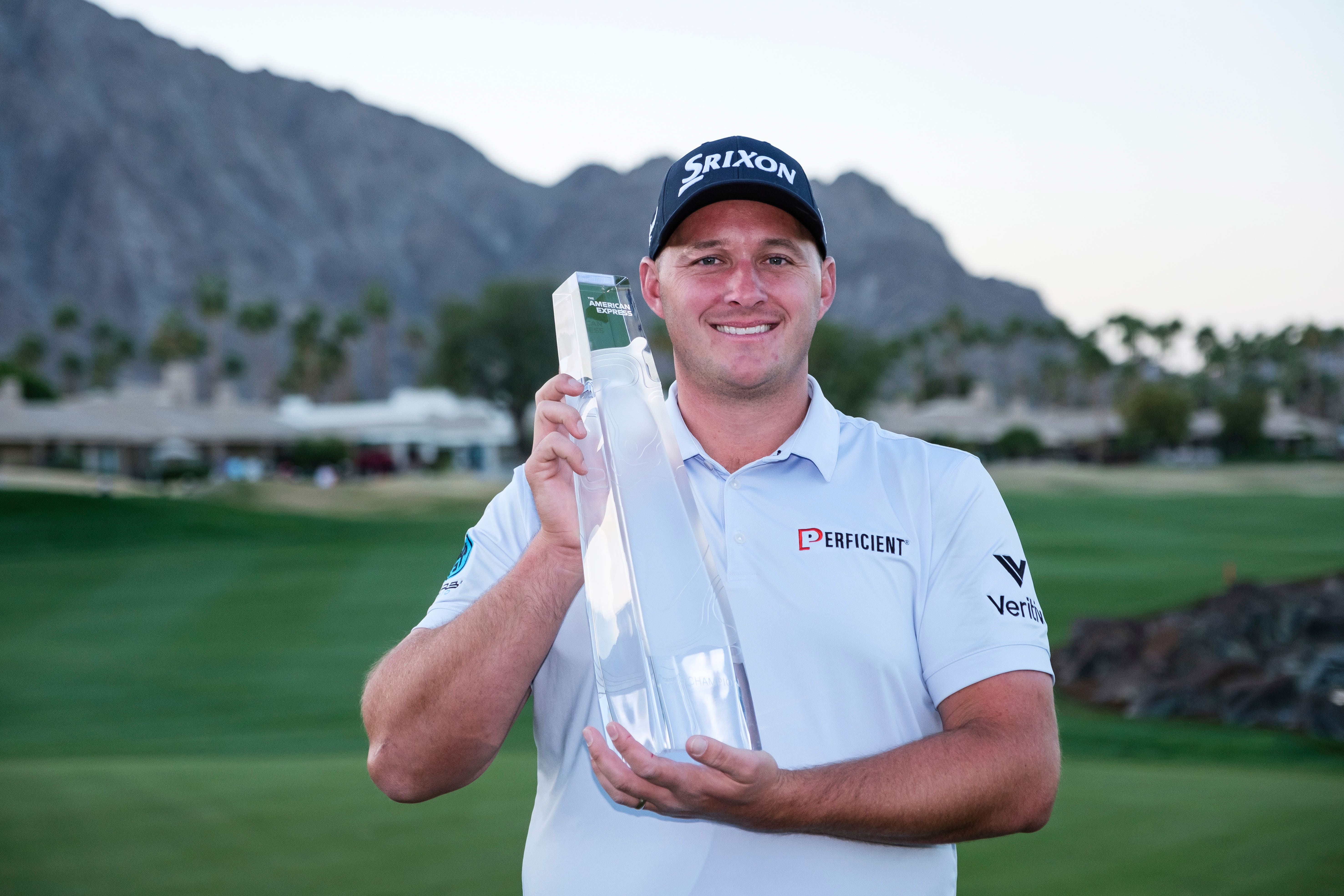 Sepp Straka holds the trophy after winning the American Express golf tournament in La Quinta, California (William Liang/AP)