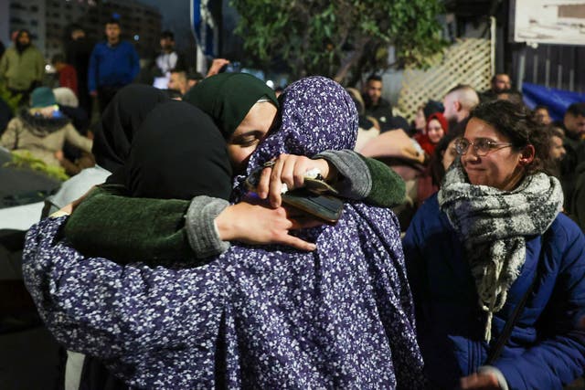 <p>A Palestinian prisoner is welcomed by relatives upon the arrival of some 90 prisoners set free by Israel</p>