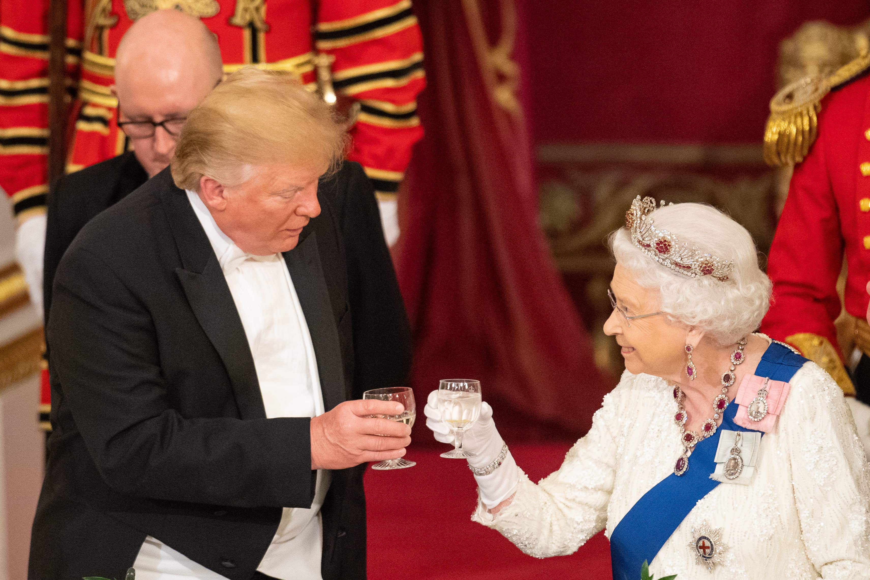 Donald Trump and the late Queen Elizabeth II make a toast during the state banquet at Buckingham Palace in June 2019 (Dominic Lipinski/PA)