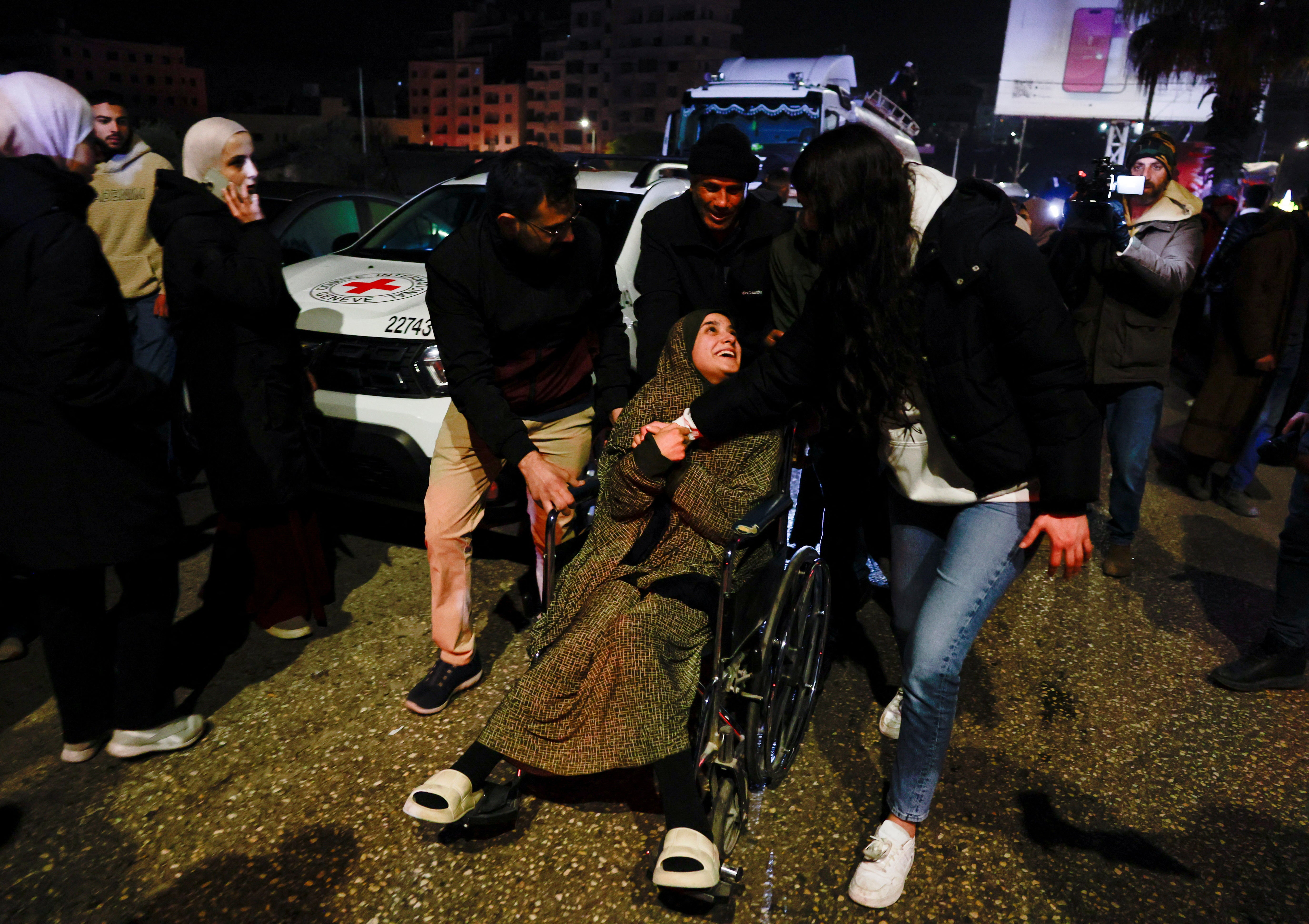 A freed Palestinian prisoner is greeted after being released from an Israeli jail