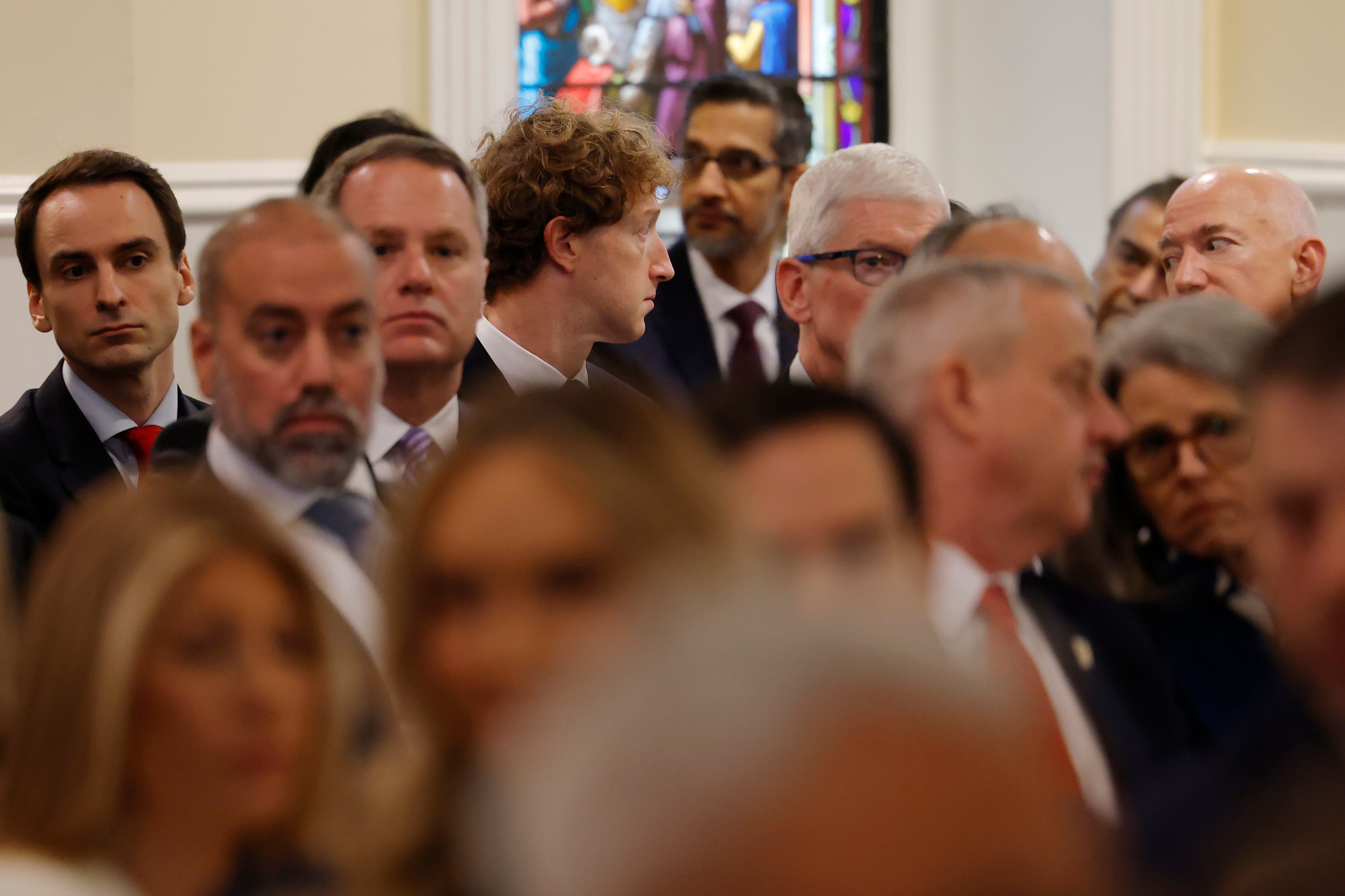 Tech leaders Mark Zuckerberg, Jeff Bezos, and Tim Cook were seen sitting together at a morning church service ahead of Donald Trump inauguration