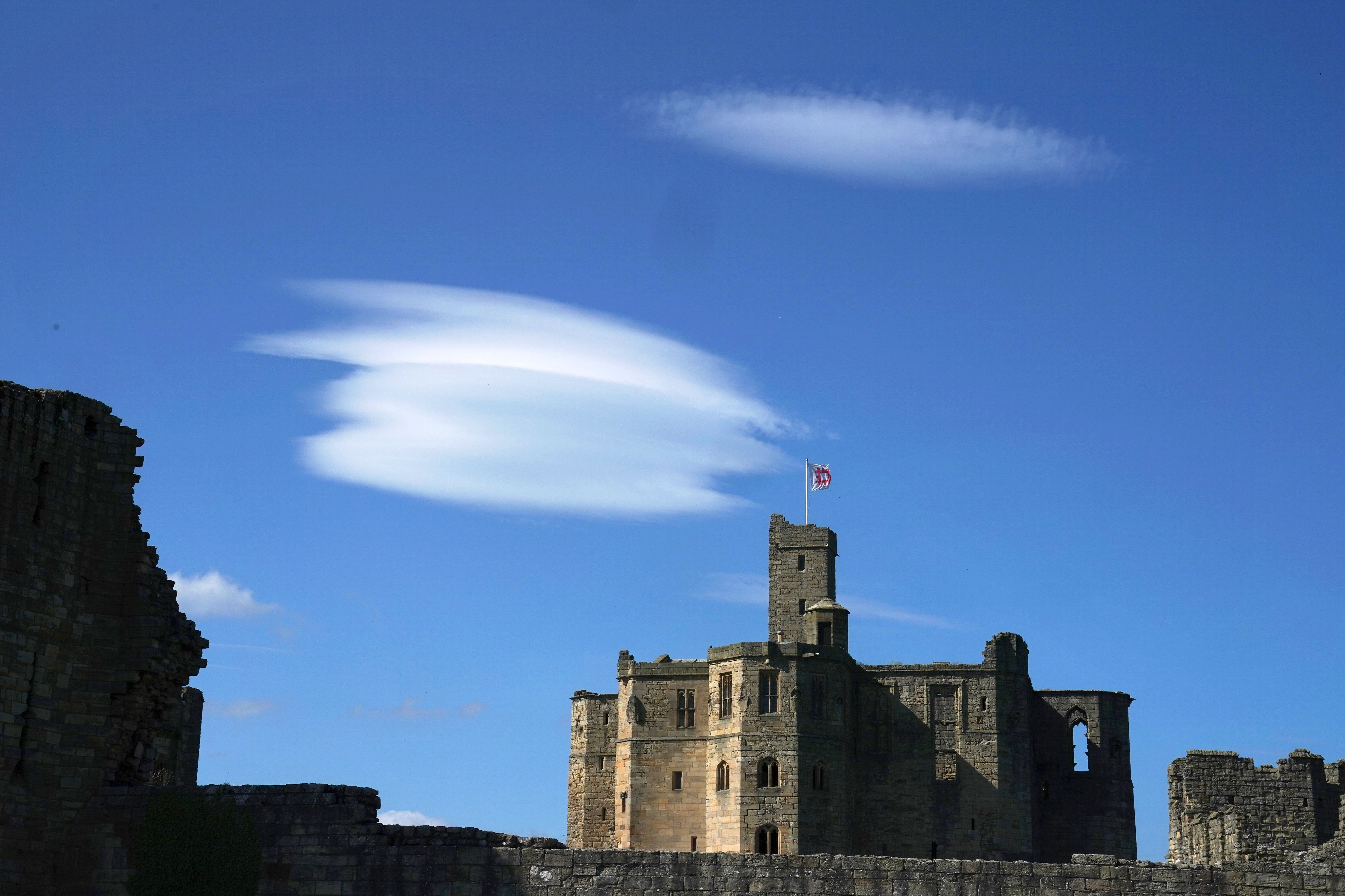 Lenticular clouds over English Heritage’s Warkworth Castle in Northumberland