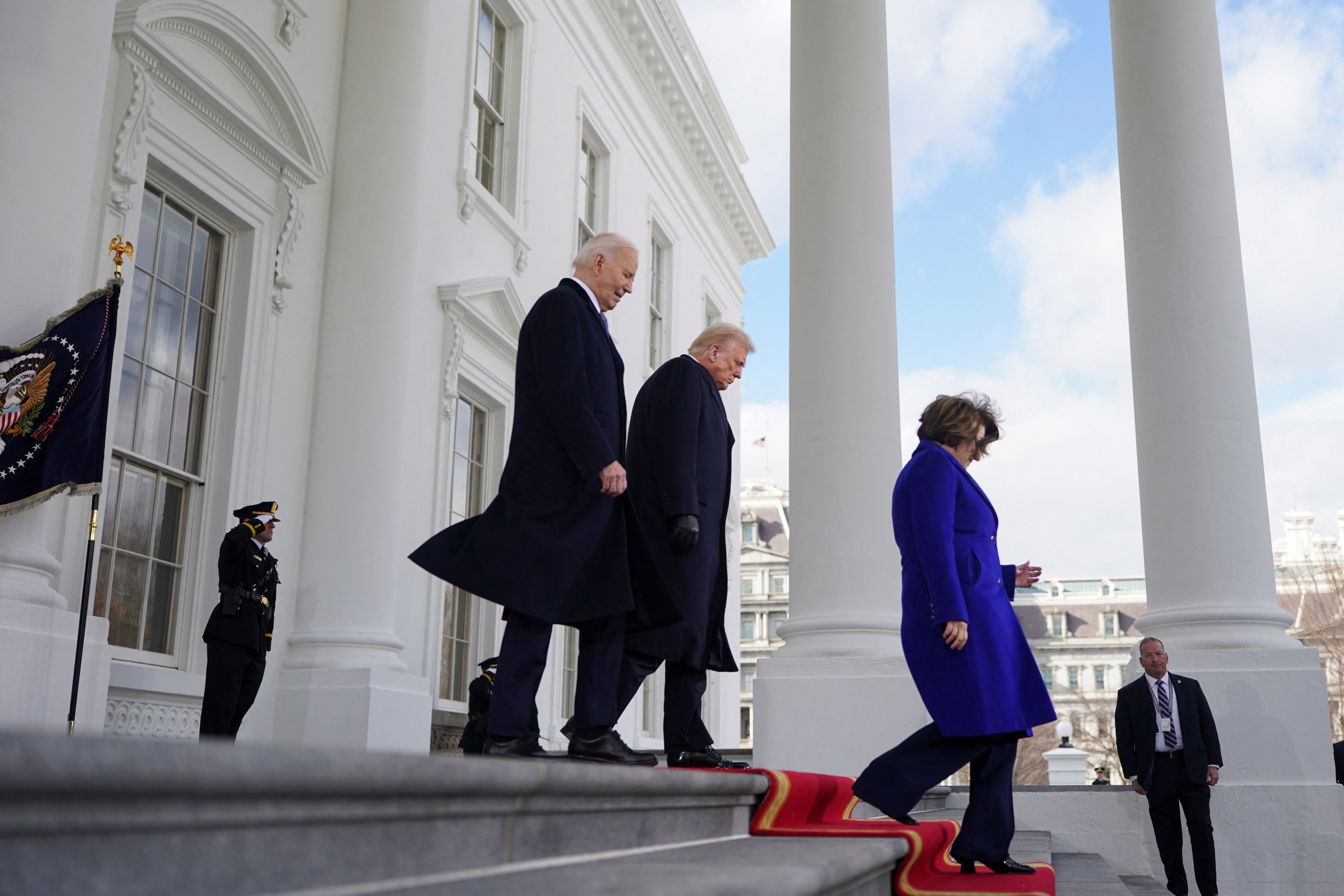 President-elect Donald Trump walks with US President Joe Biden at the White House with Senator Amy Klobuchar