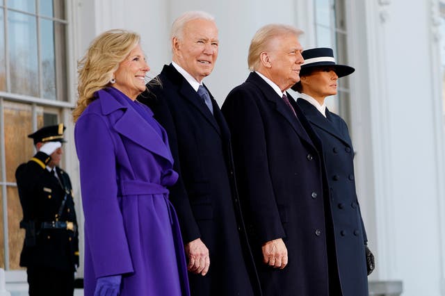 <p>Presidents Joe Biden and Donald Trump at Monday’s inauguration. A recent poll says time will not be kind to Biden’s reputation </p>