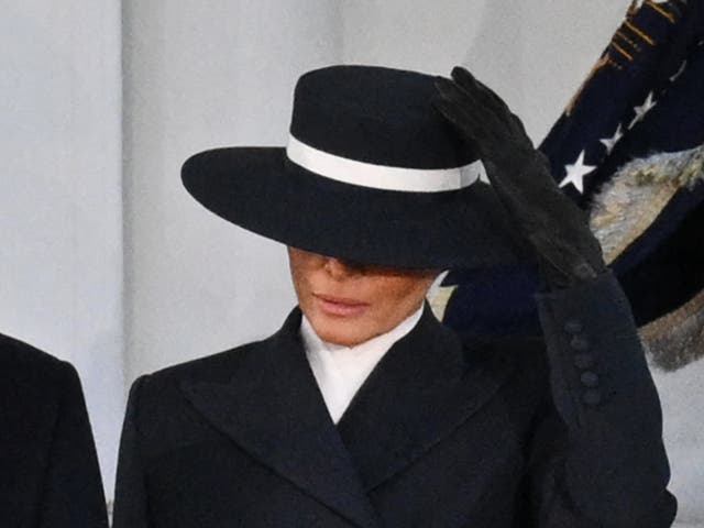 <p>Melania Trump shields her eyes under an Eric Javits top hat for Inauguration Day 2025 </p>