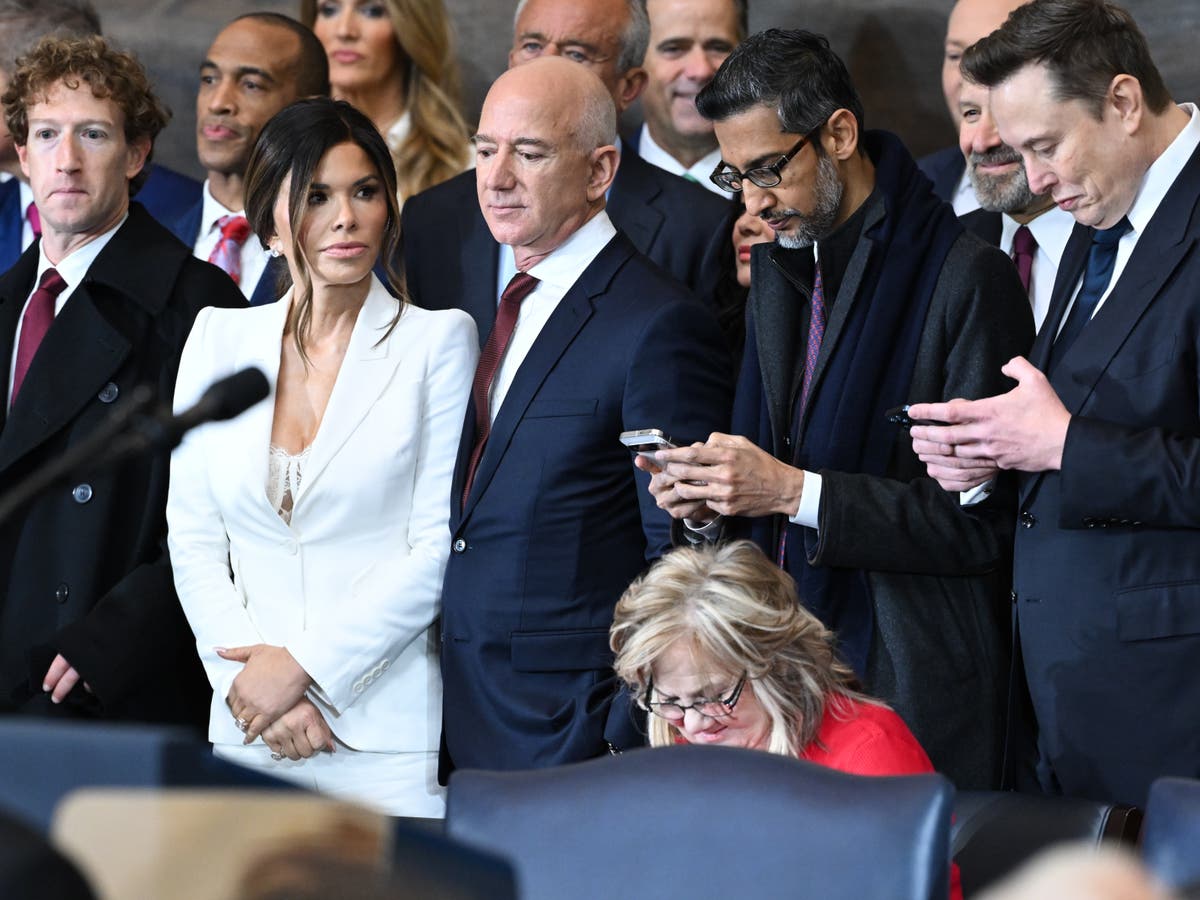 The country’s most notorious billionaire rivals sat together at Trump’s inauguration