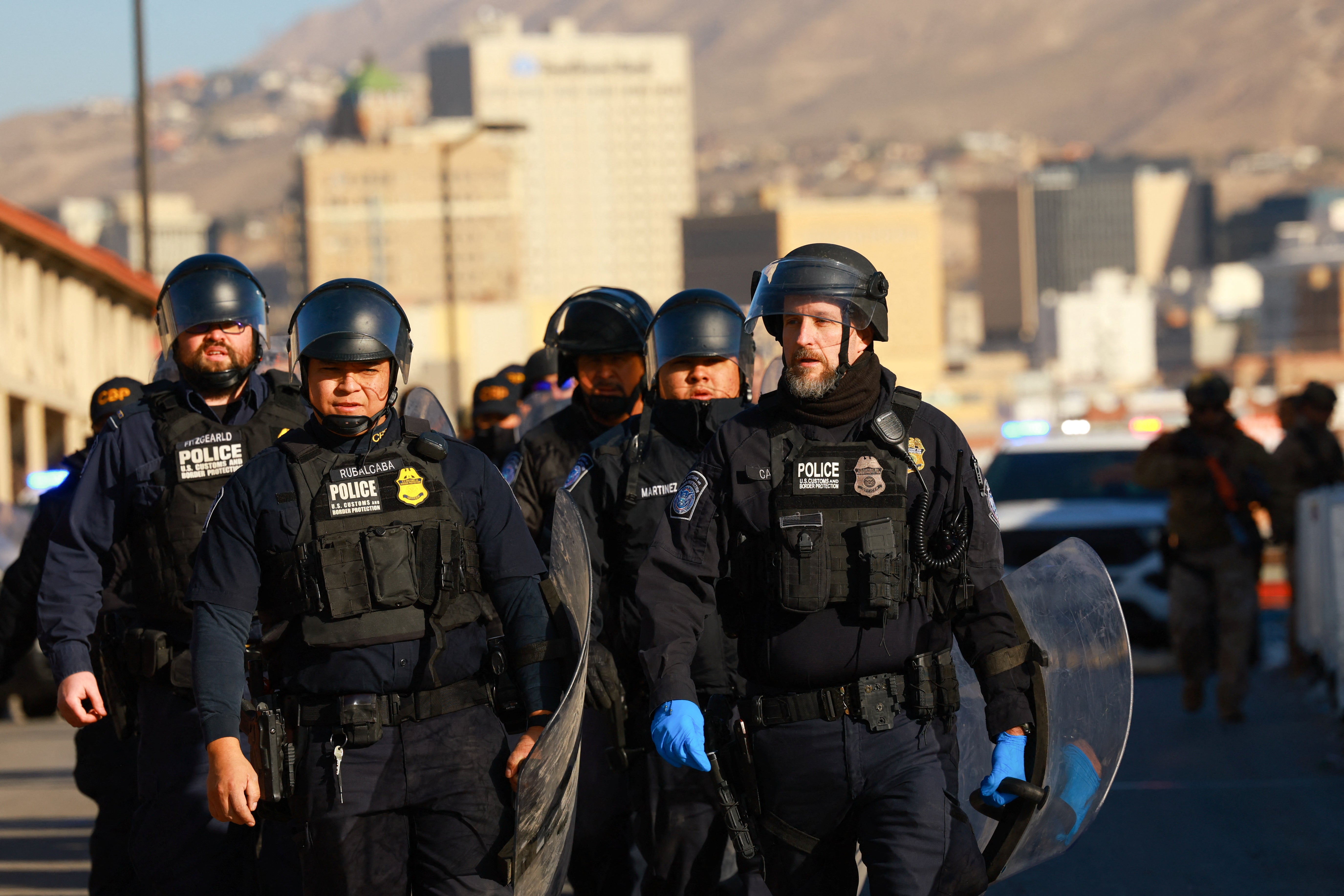 Customs and Border Enforcement Agents arrive at the U.S.-Mexico border on January 20