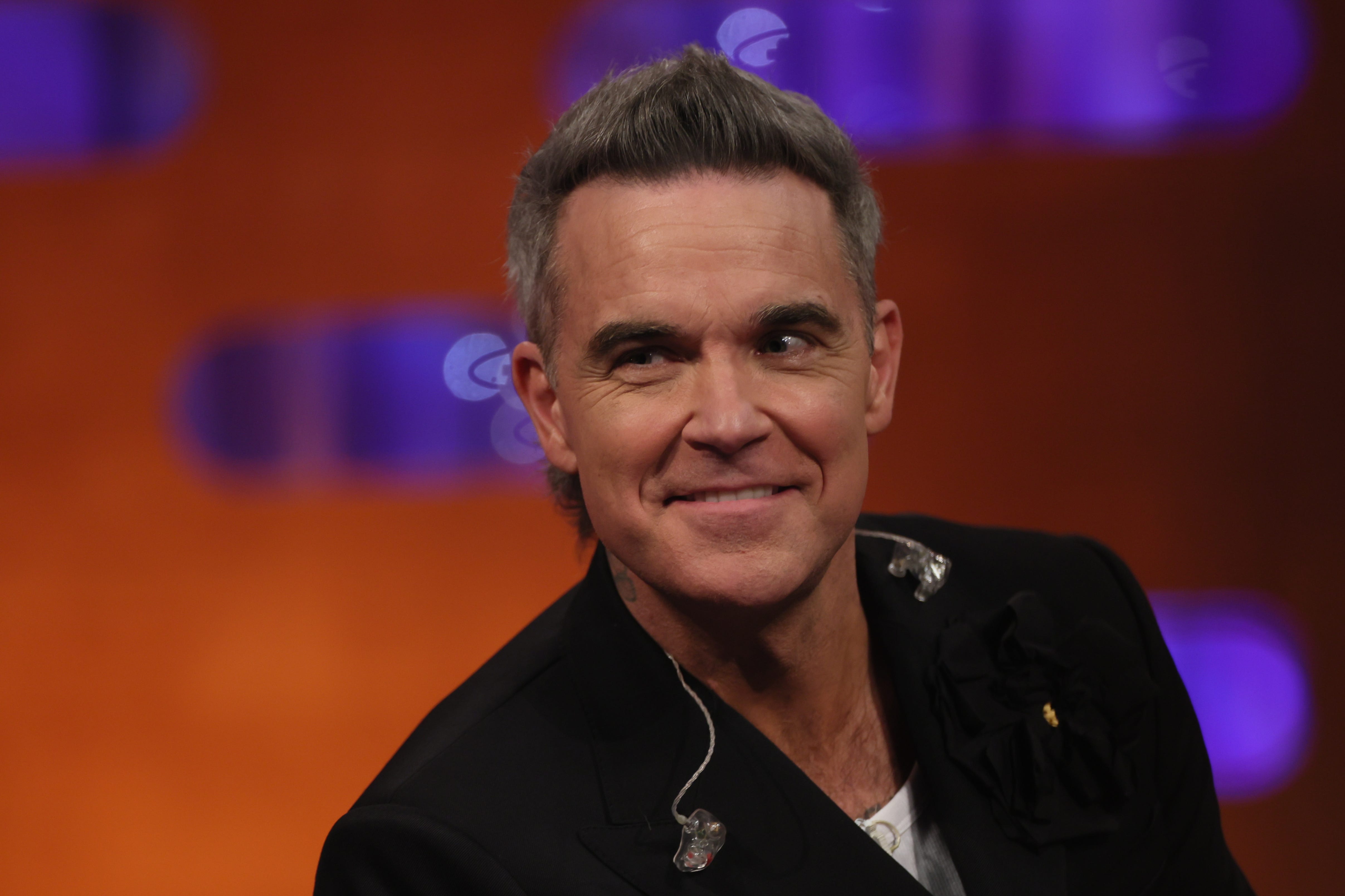 Robbie Williams appearing on the Graham Norton show (Isabel Infantes/PA)