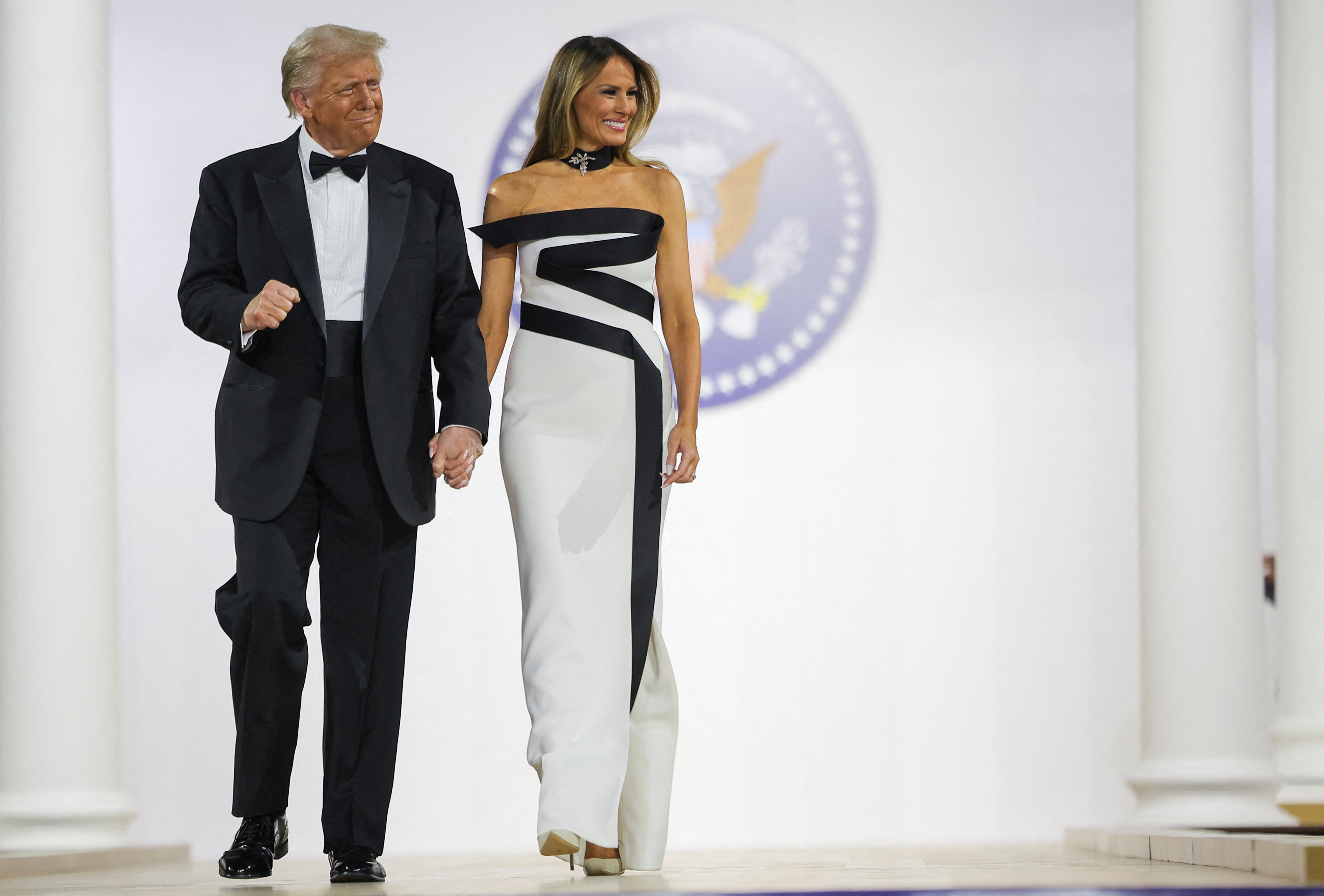 <p>US president Donald Trump and his wife, first lady Melania Trump, attend the commander in chief ball in Washington, US, 20 January 2025</p>