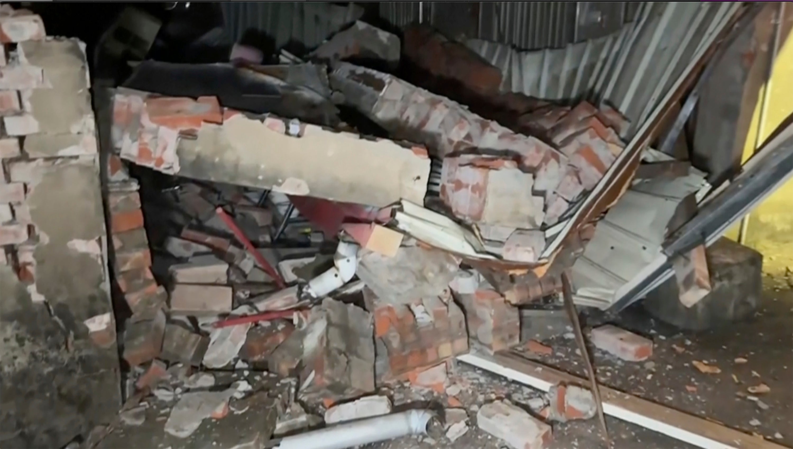 This image from a video, shows debris from a collapsed house in Tainan, Taiwan Tuesday, 21 January 2025, after an earthquake