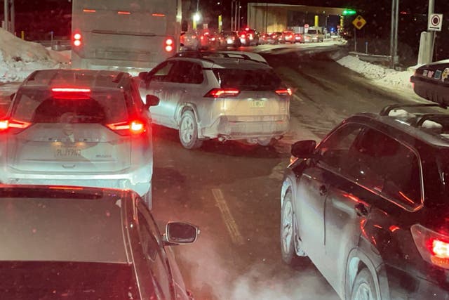 <p>Cars are backed up at the US-Canada border in Stanstead, Quebec, after a shooting involving a U.S. Border Patrol agent in Coventry</p>