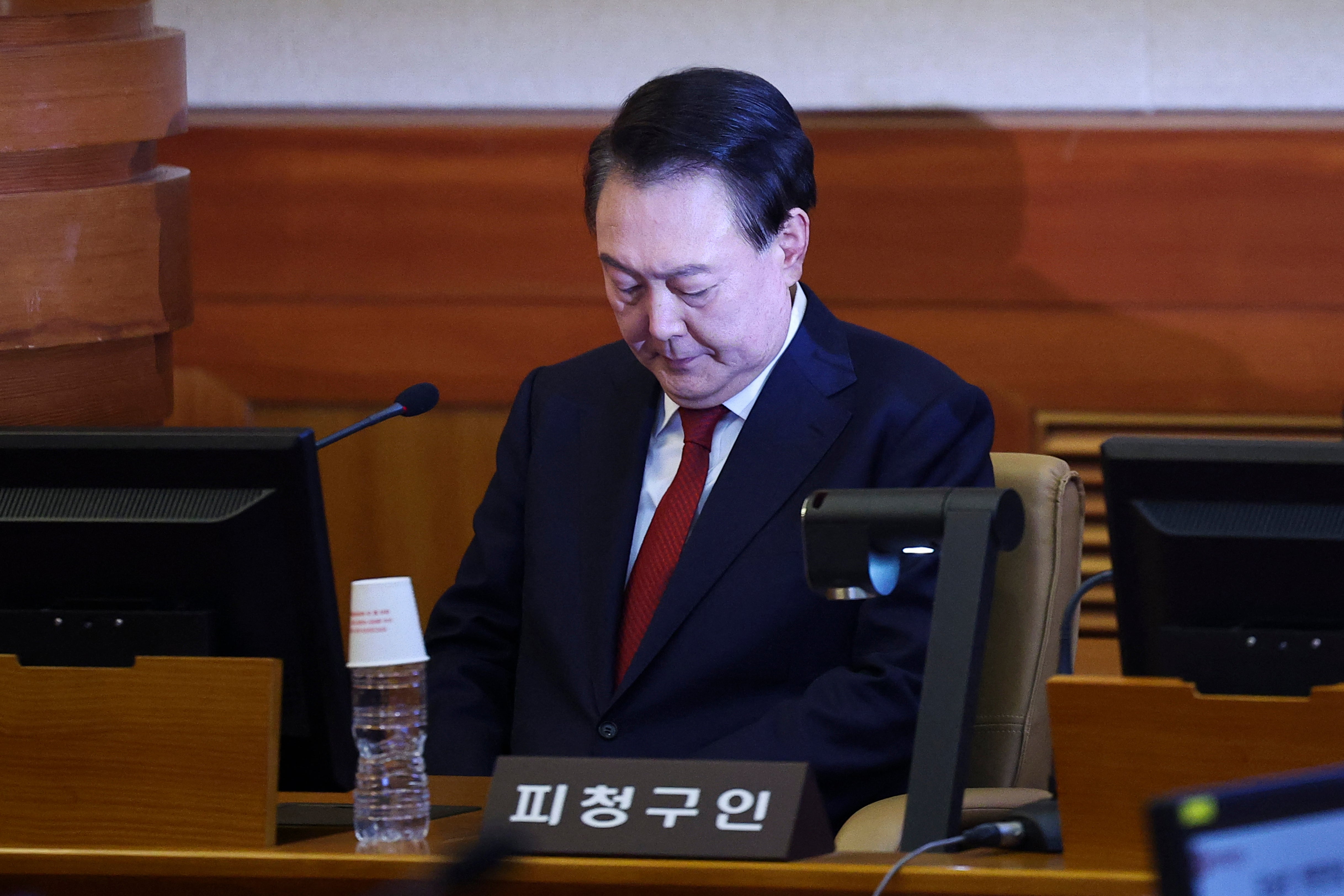 <p>South Korea's impeached President Yoon Suk Yeol attends his impeachment trial at the Constitutional Court in Seoul on 21 January 2025</p>