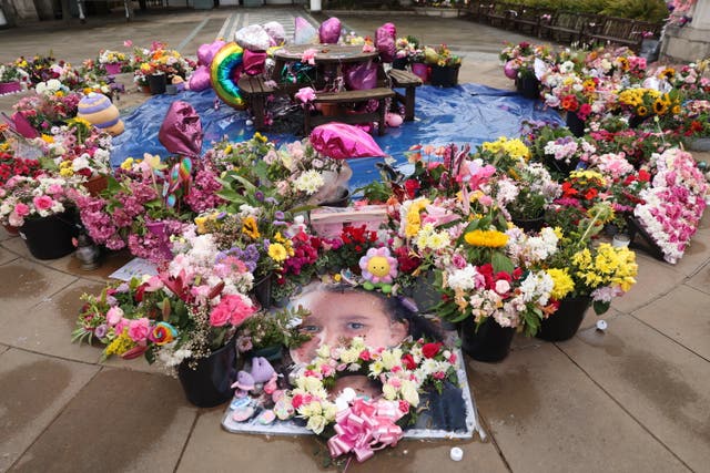<p>Flowers and tributes outside the Atkinson Art Centre in Southport for the three girls who died in Axel Rudakubana’s knife attack in Southport (Paul Currie/PA)</p>