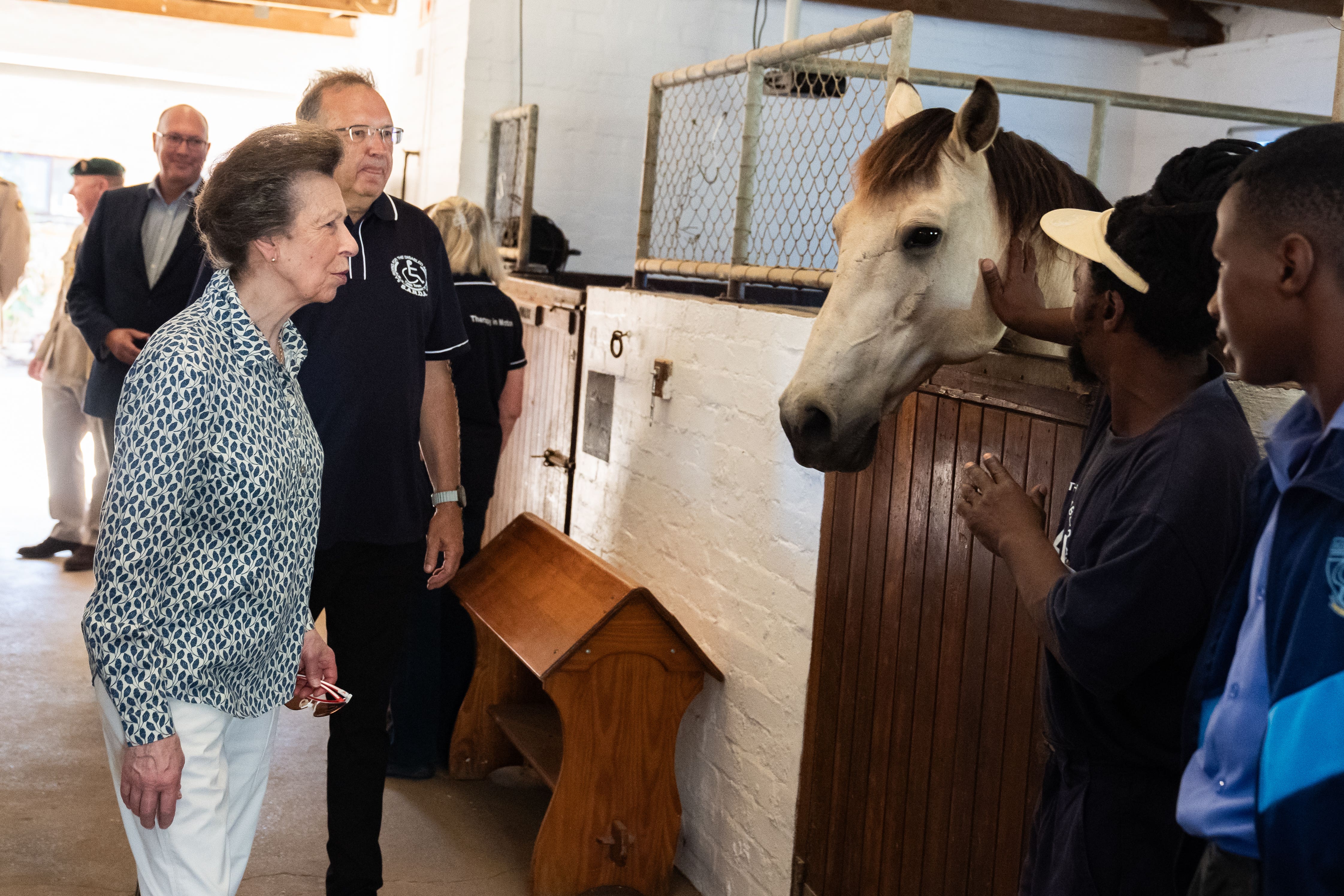The Princess Royal views a horse called Maverick during a visit to the South African Riding School for Disabled Association (Aaron Chown/PA)