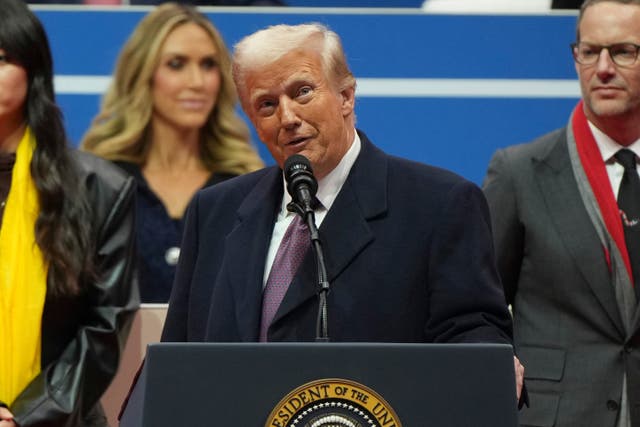 President Donald Trump speaks at an indoor Presidential Inauguration parade event in Washington (AP Photo/Matt Rourke)