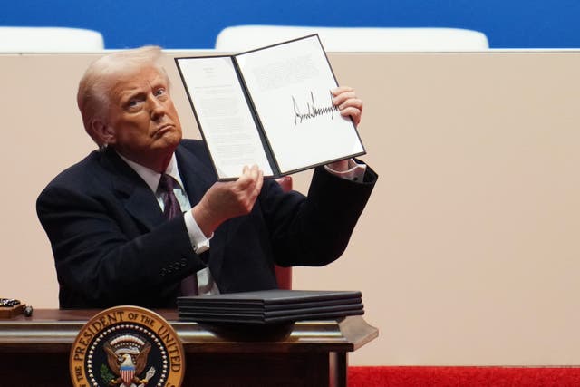 <p>Donald Trump signed executive actions onstage in front of thousands of fans and the cameras on Monday, as he promised to bring back the spectacle of reality TV to government</p>