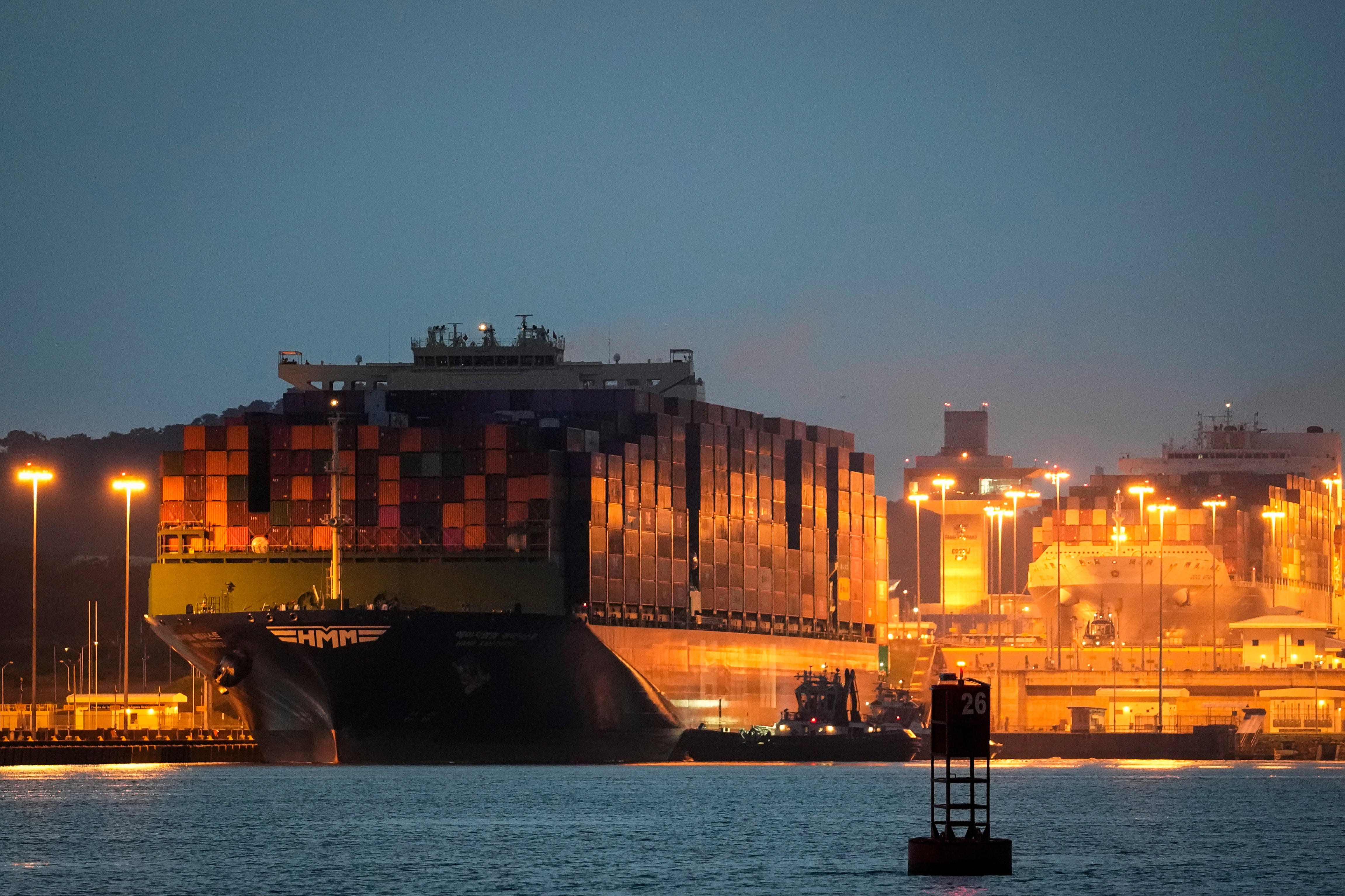 A cargo ship sails through the Miraflores locks of the Panama Canal, in Panama City