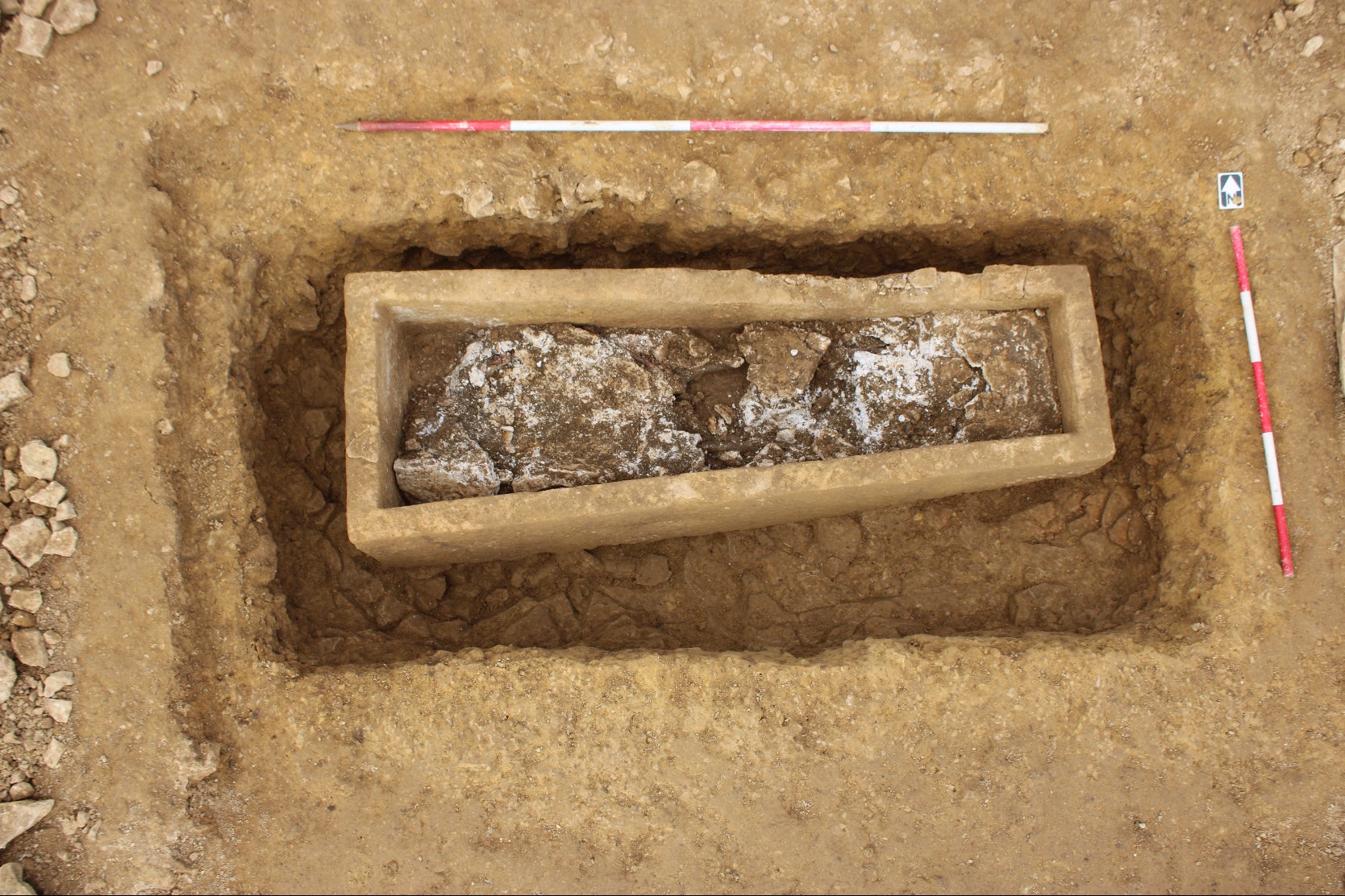 Stone coffin with gypsum poured over it