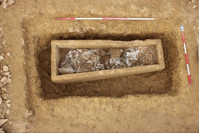 <p>Stone coffin with gypsum poured over it </p>