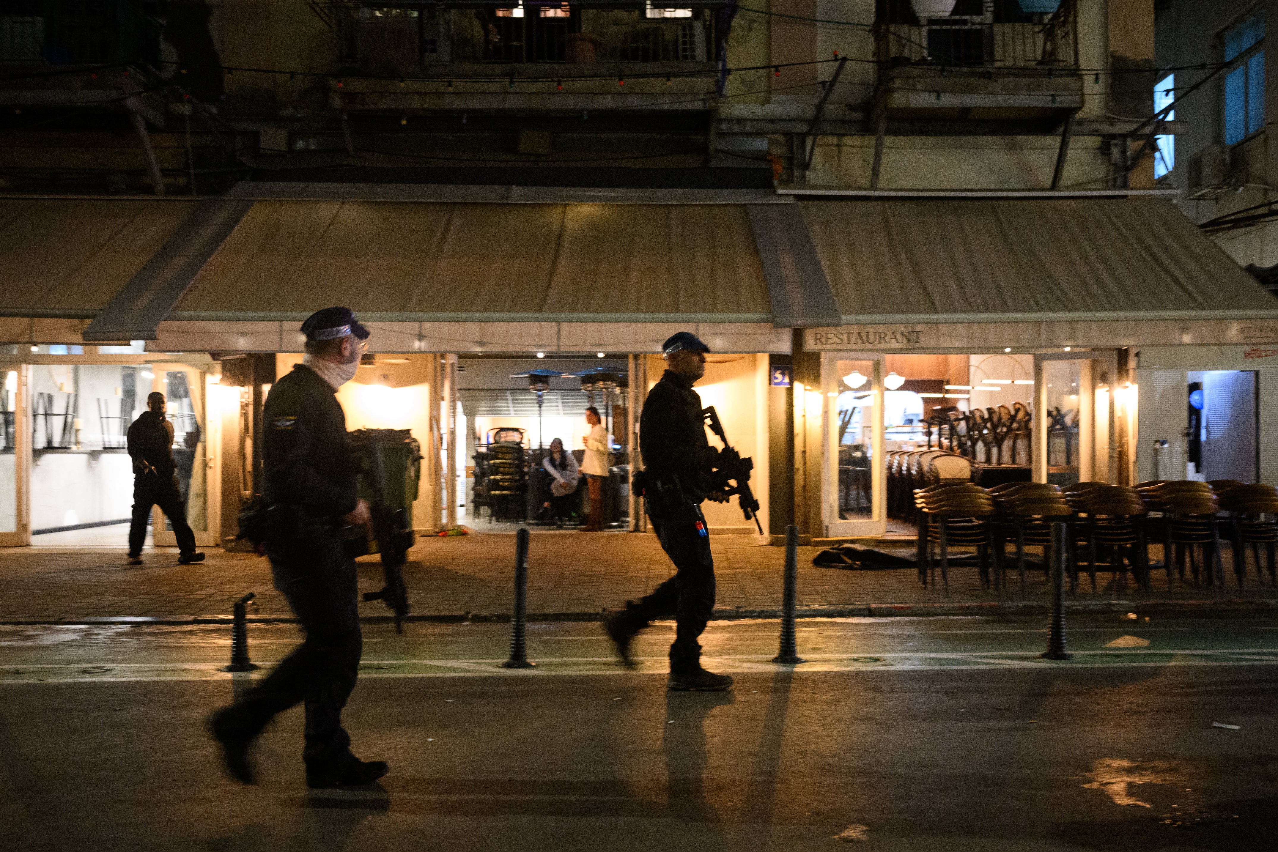 Police patrol the area along Nahalat Binyamin street and Rothschild after at a nearby restaurant, four people were stabbed and wounded on 21 January 2025 in Tel Aviv, Israel