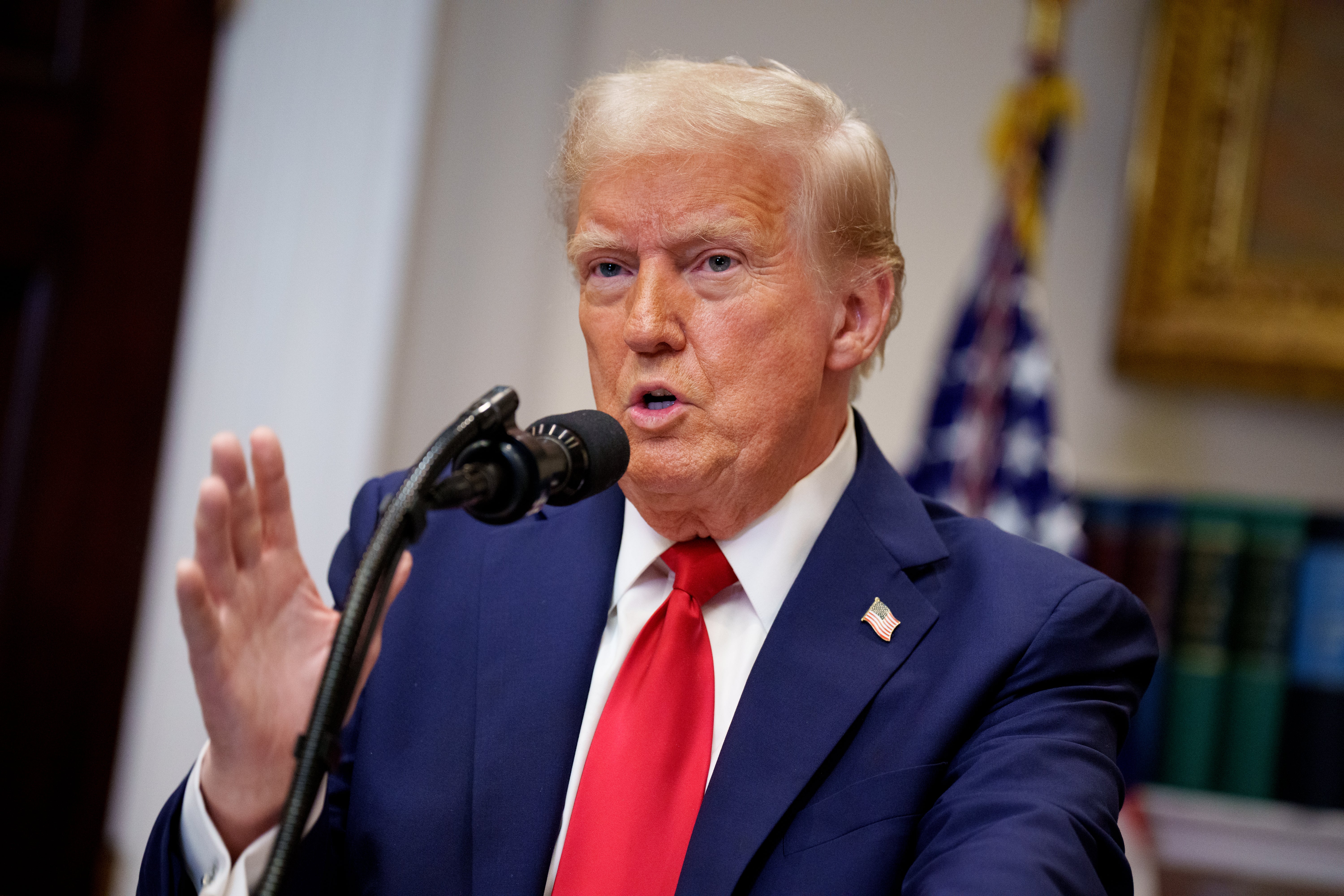 US president Donald Trump speaks during a news conference in the Roosevelt Room of the White House