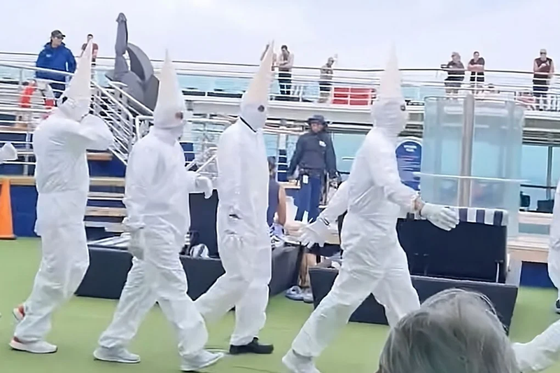 Passengers stunned as cruise workers appear on deck in Ku Klux Klan-like costumes