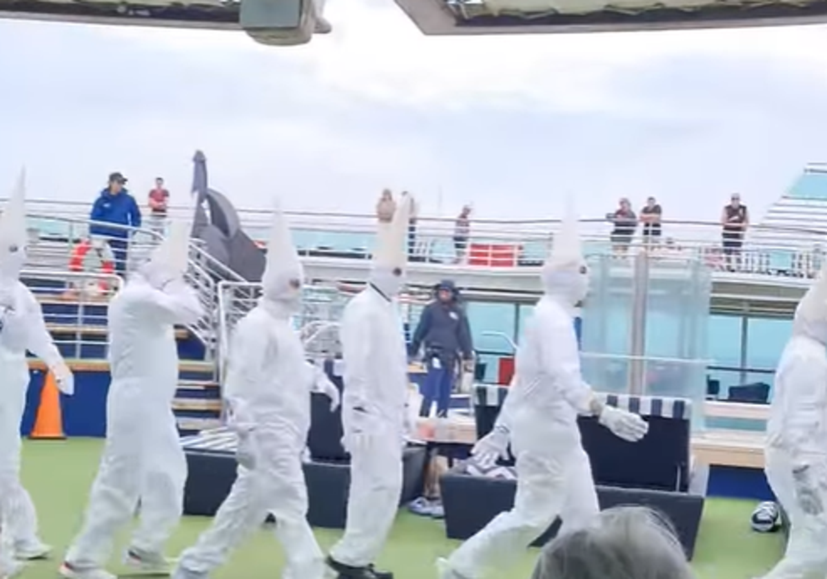 Passengers stunned as cruise workers appear on deck in Ku Klux Klan-like costumes