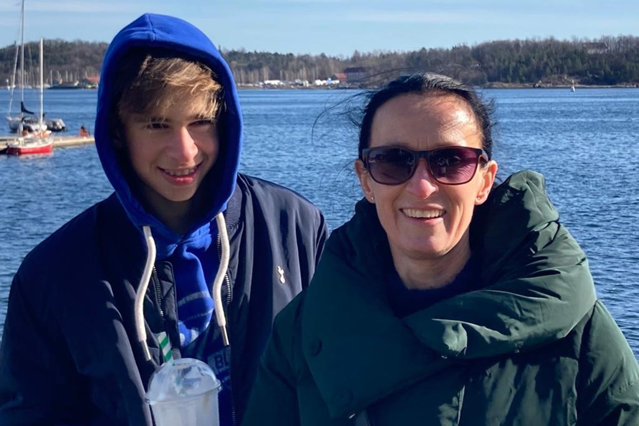 Ben, pictured with his mother Sue, said cardiac arrest could happen to anyone