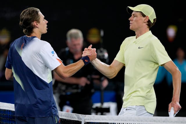 <p>Jannik Sinner (right) defeats Alex de Minaur in straight sets in Australian Open quarter-final</p>