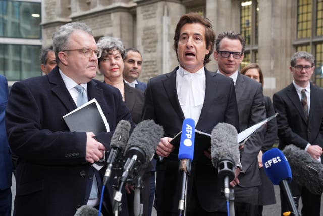 Lord Tom Watson and the Duke of Sussex’s barrister, David Sherborne spoke to the media after they settled their legal action against the publisher of The Sun over allegations of unlawful information-gathering (Lucy North/PA)