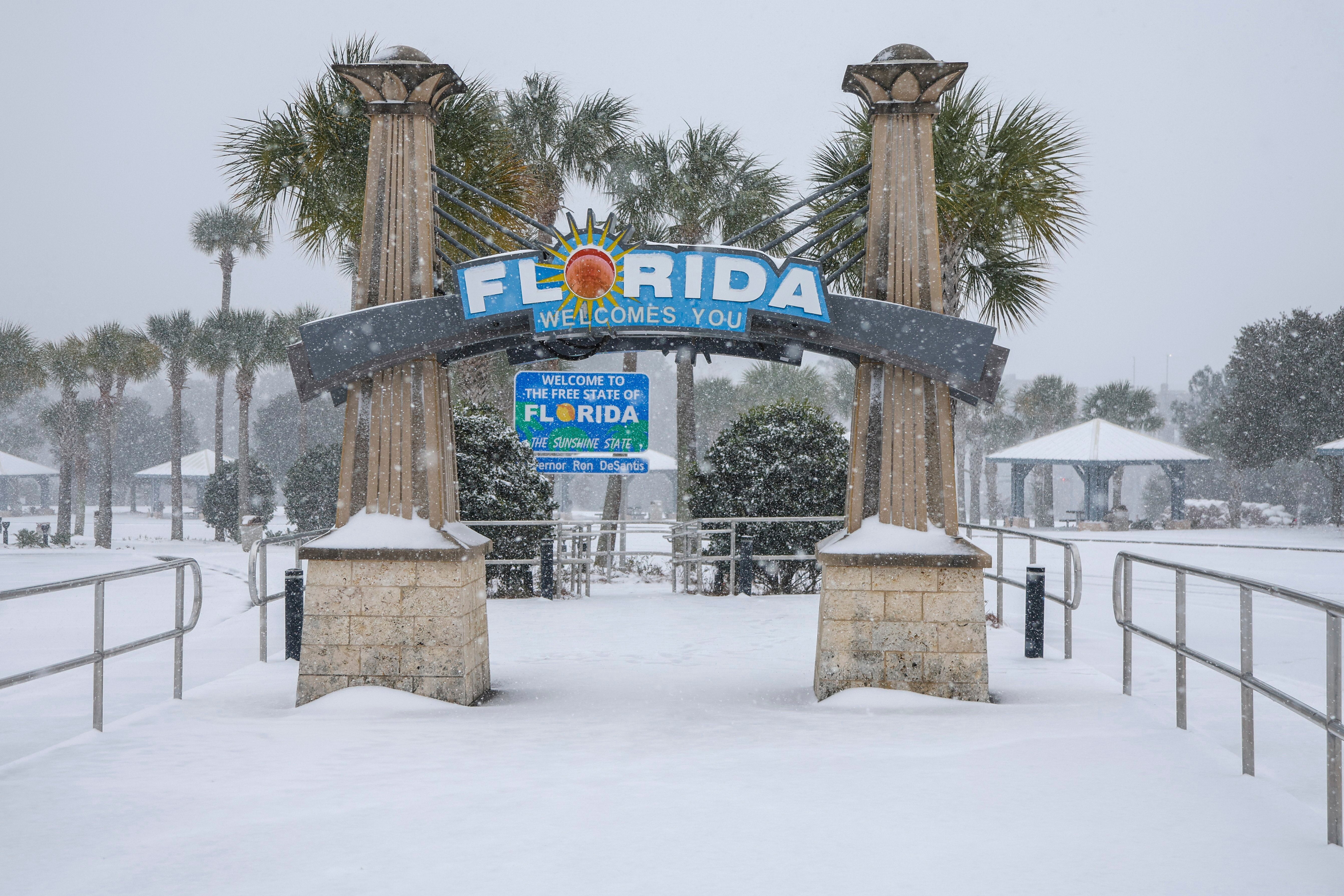 Heavy snow falls onto the Florida Welcome Center on in Pensacola. The Sunshine State saw its most snowfall in history