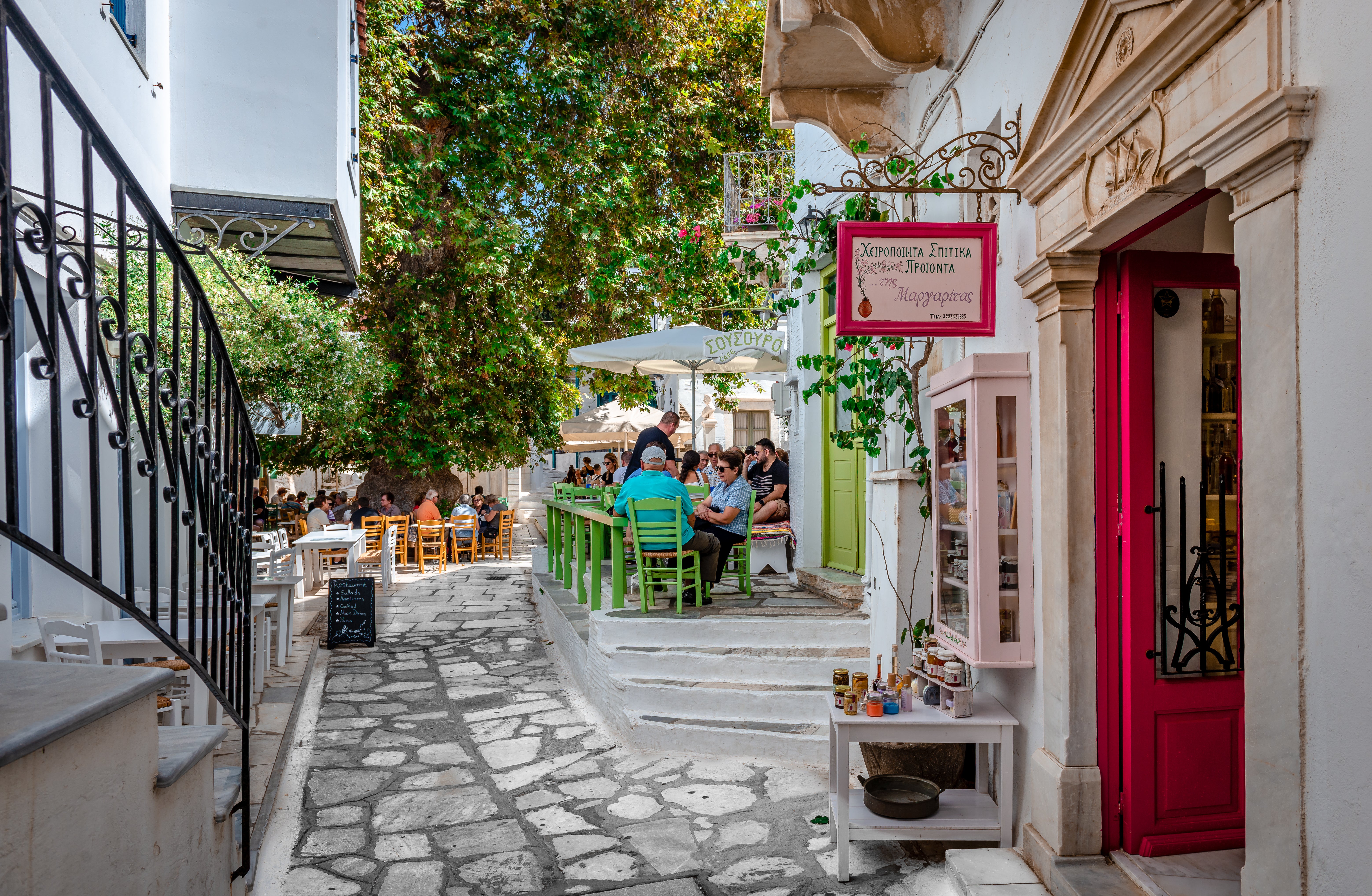 Pyrgos’ vine-lined streets hide hole-in-the wall tavernas and quirky shops