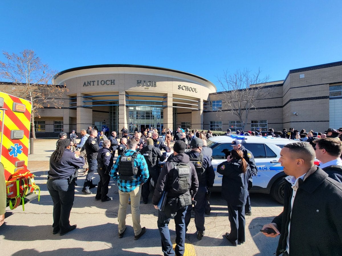 Police outside Antioch High School in Nashville after a shooting left one person dead and one hurt. Police say the shooter turned the gun on themselves after injuring two