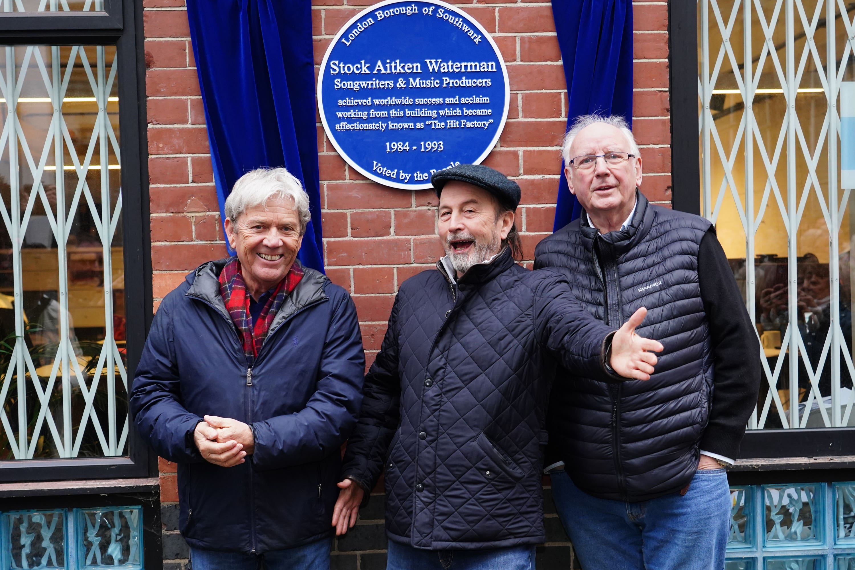 Mike Stock, Matt Aitken and Pete Waterman during the unveiling of a Historic England blue plaque in their honour at Vine Yard Studios in London (Ian West/PA)