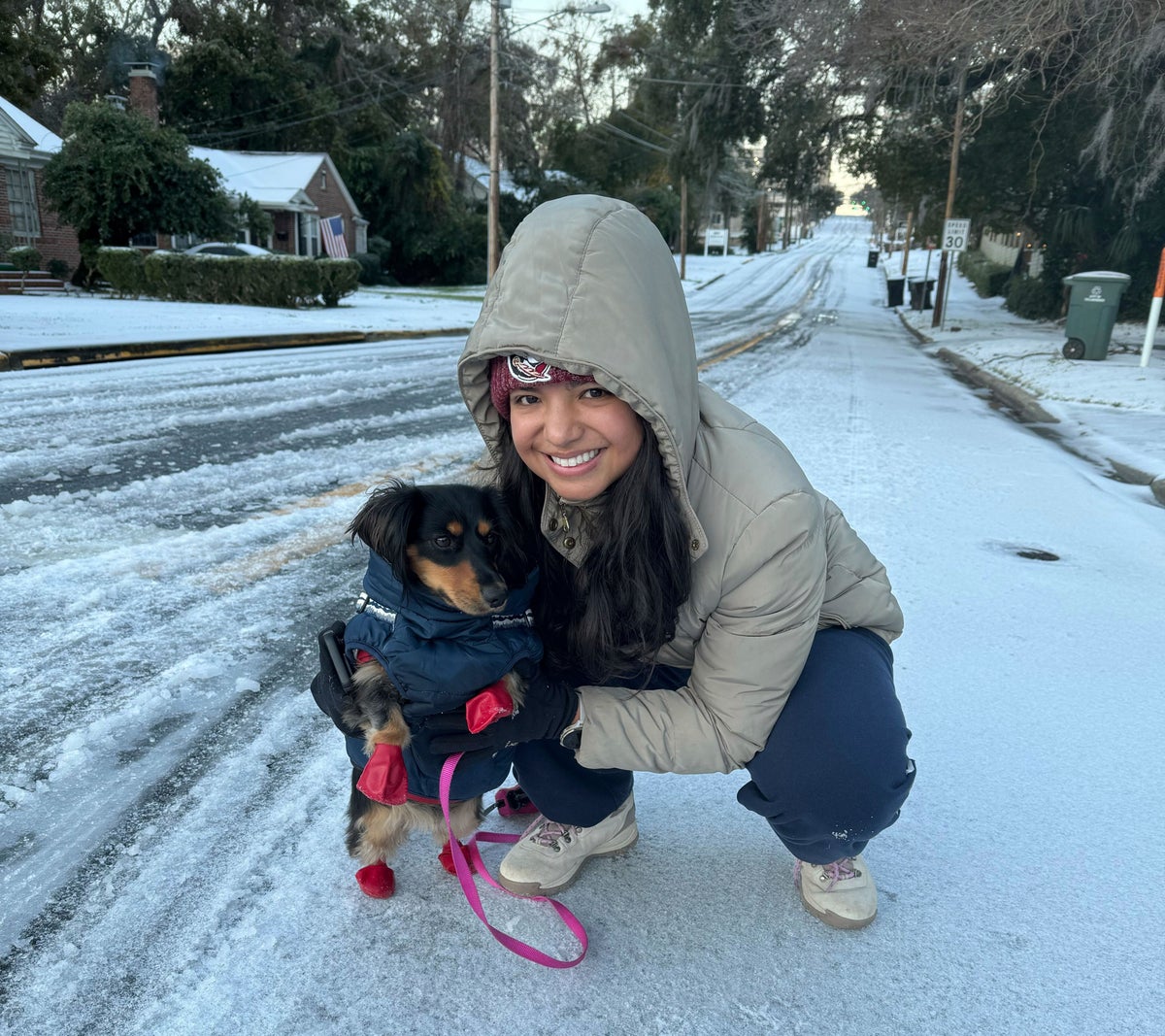 Sledding on boogie boards, ice hockey on Canal Street: The Gulf Coast embraces a rare snow day