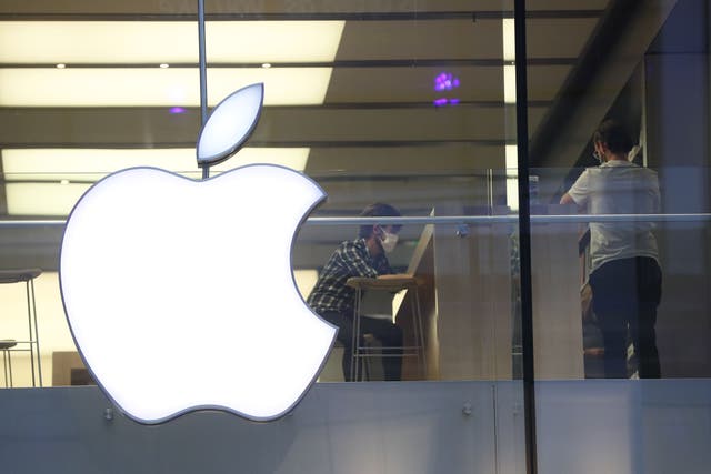 <p>Twelve people have been charged after phones were stolen from 13 different Apple stores (PA)</p>