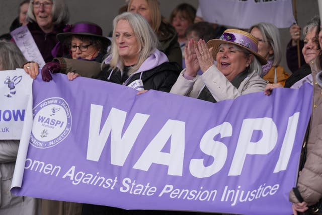 People at a Women Against State Pension Inequality (WASPI) protest outside the Scottish Parliament in Edinburgh, campaigning for justice and full compensation. Picture date: Thursday April 18, 2024 (Andrew Milligan/PA)