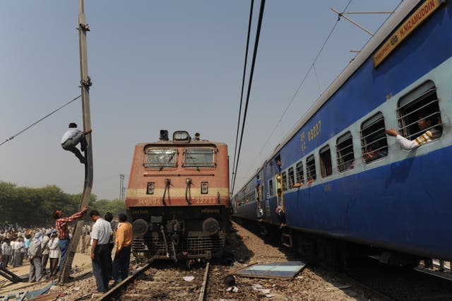 <p>File. Two Indian trains after a collision in 2009 </p>