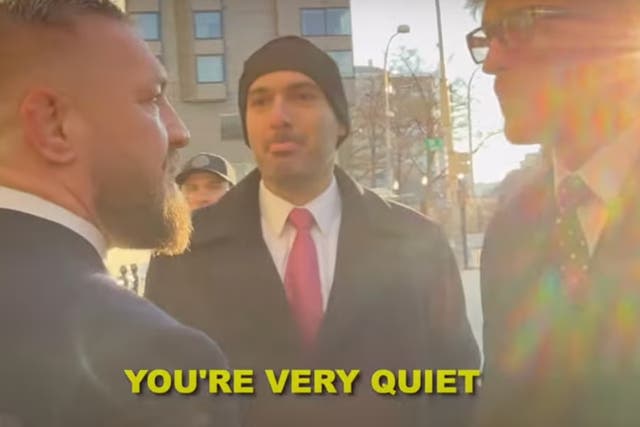 pConor McGregor (left) speaking to Logan Paul/p