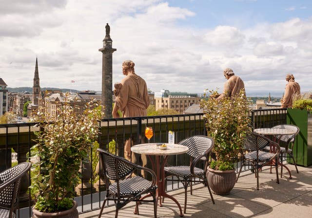 <p>Cocktails with a view: Look over the Edinburgh cityscape at the Gleneagles Townhouse terrace</p>