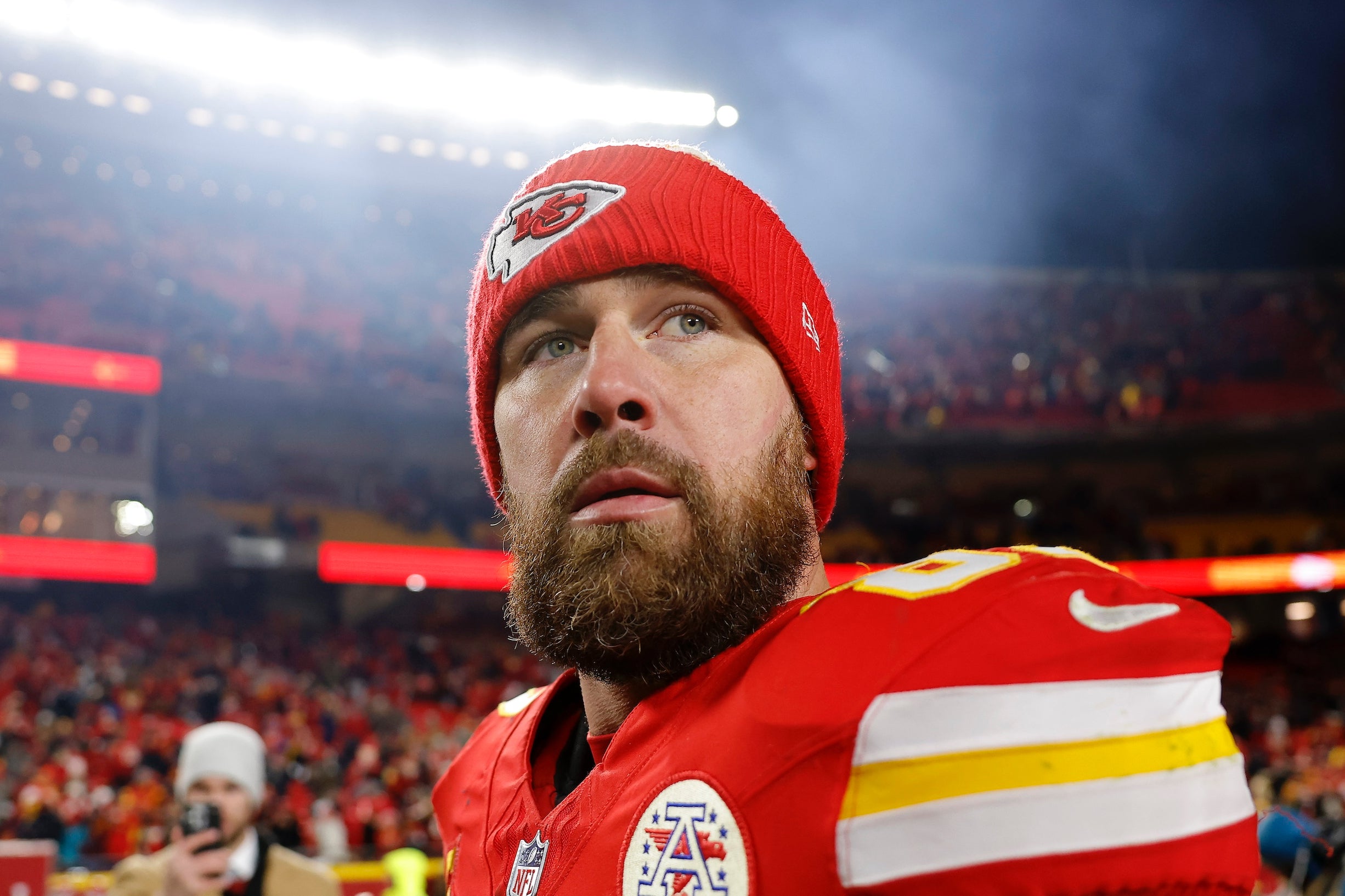 <p>Travis Kelce #87 of the Kansas City Chiefs looks on after defeating the Houston Texans in the AFC Divisional Playoff at GEHA Field at Arrowhead Stadium on January 18, 2025</p>